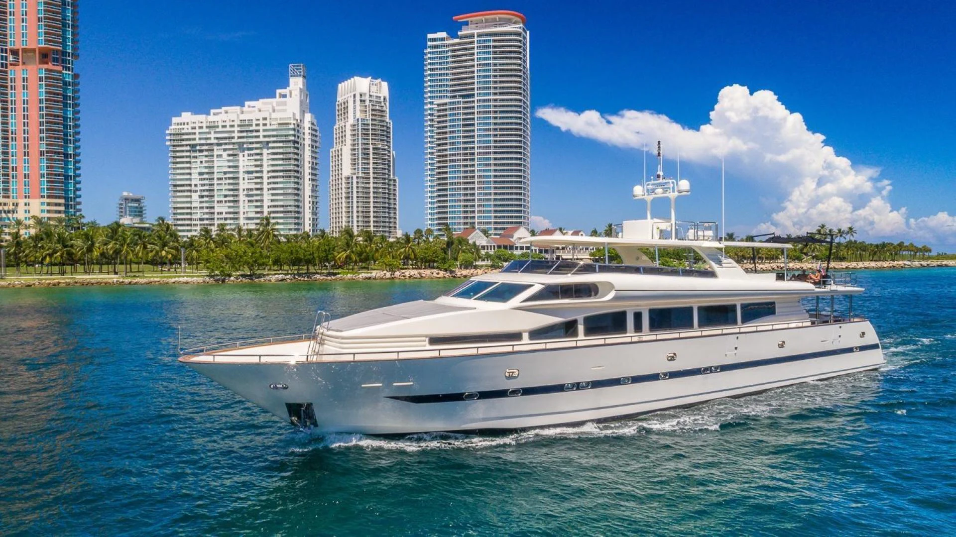 a white yacht in the water aboard NIRVANA Yacht for Sale
