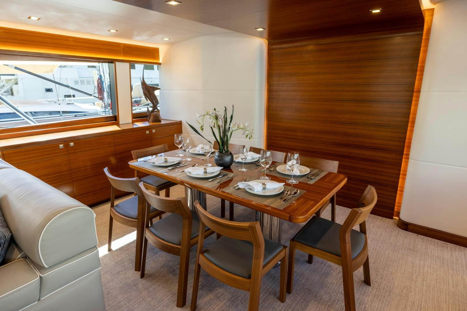 a dining table in a room aboard BONNY READ Yacht for Sale