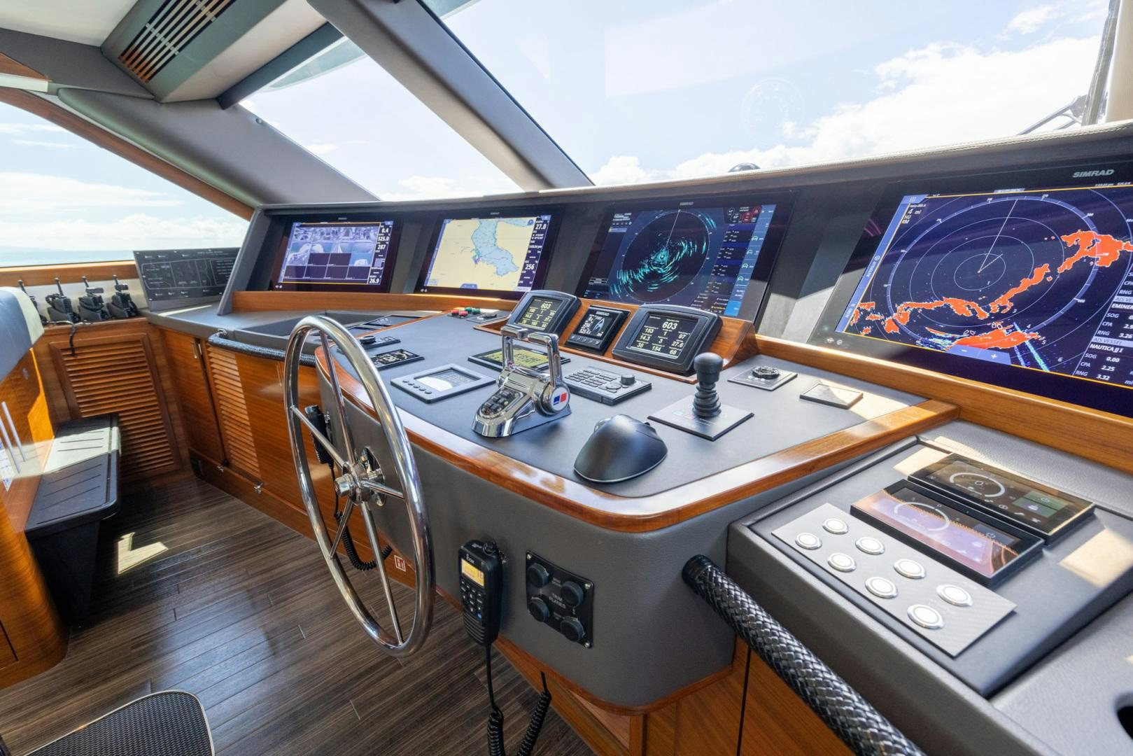 a table with many electronic devices on it aboard BONNY READ Yacht for Sale
