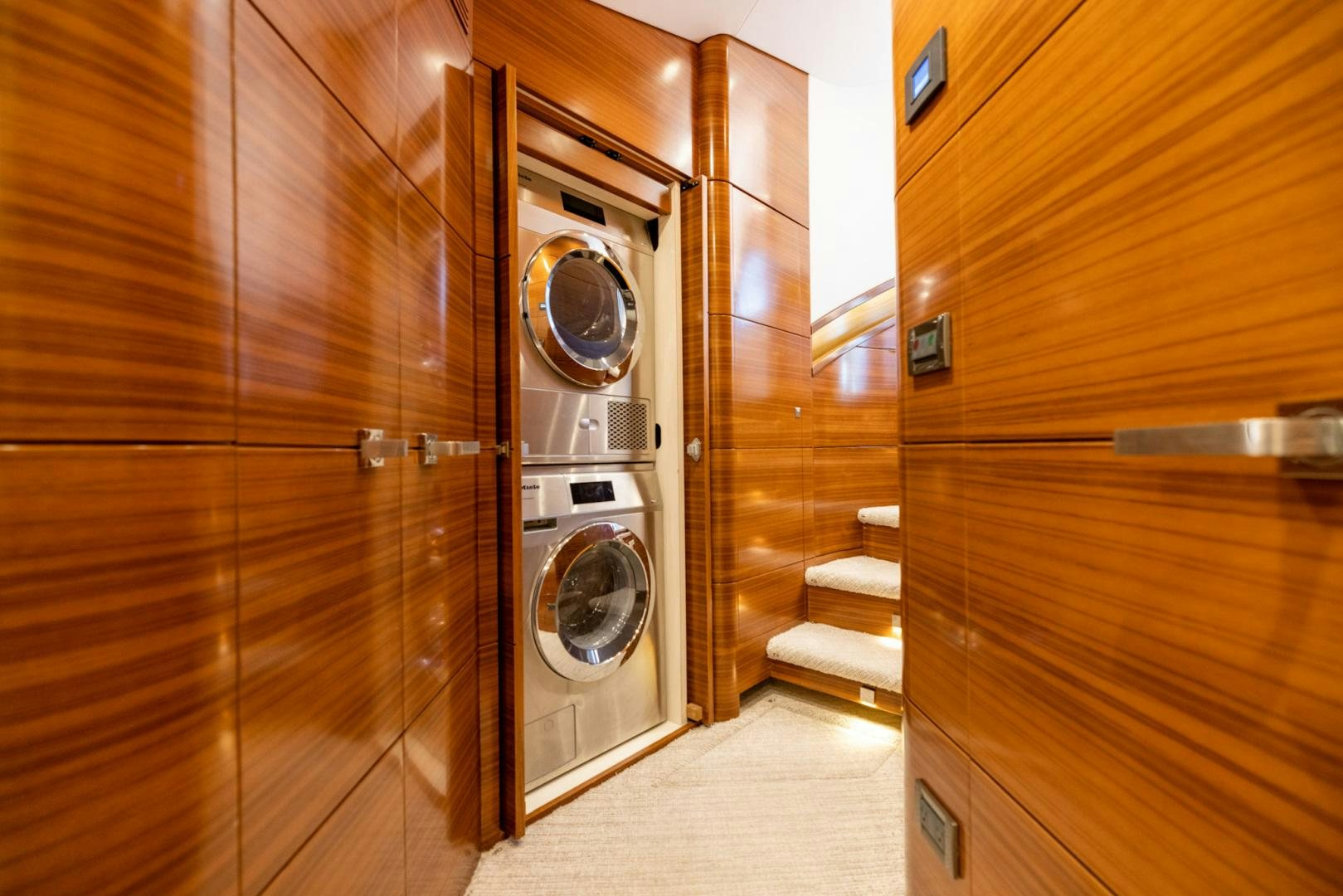 a room with a washer and dryer aboard BONNY READ Yacht for Sale