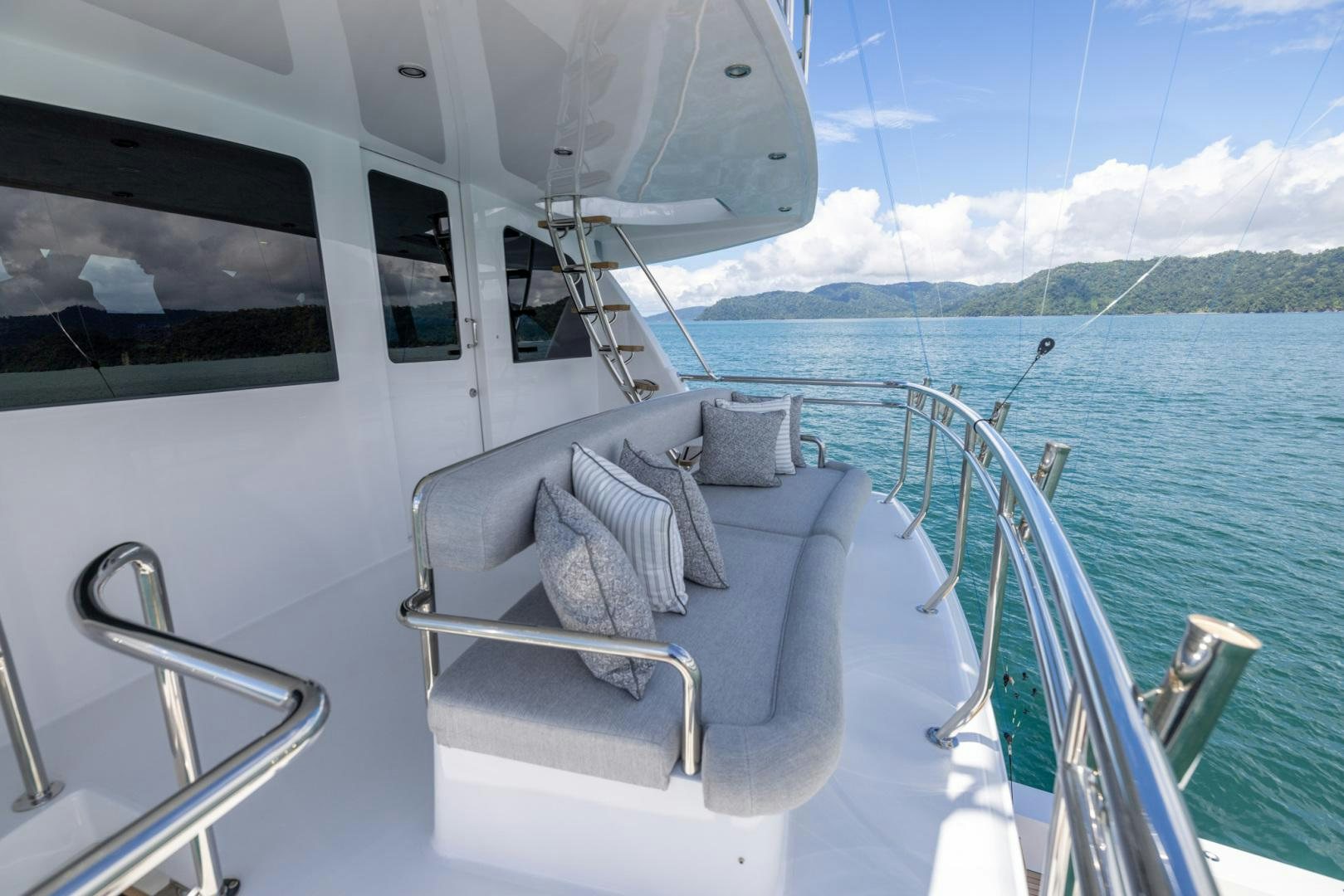 a boat with pillows on the water aboard BONNY READ Yacht for Sale