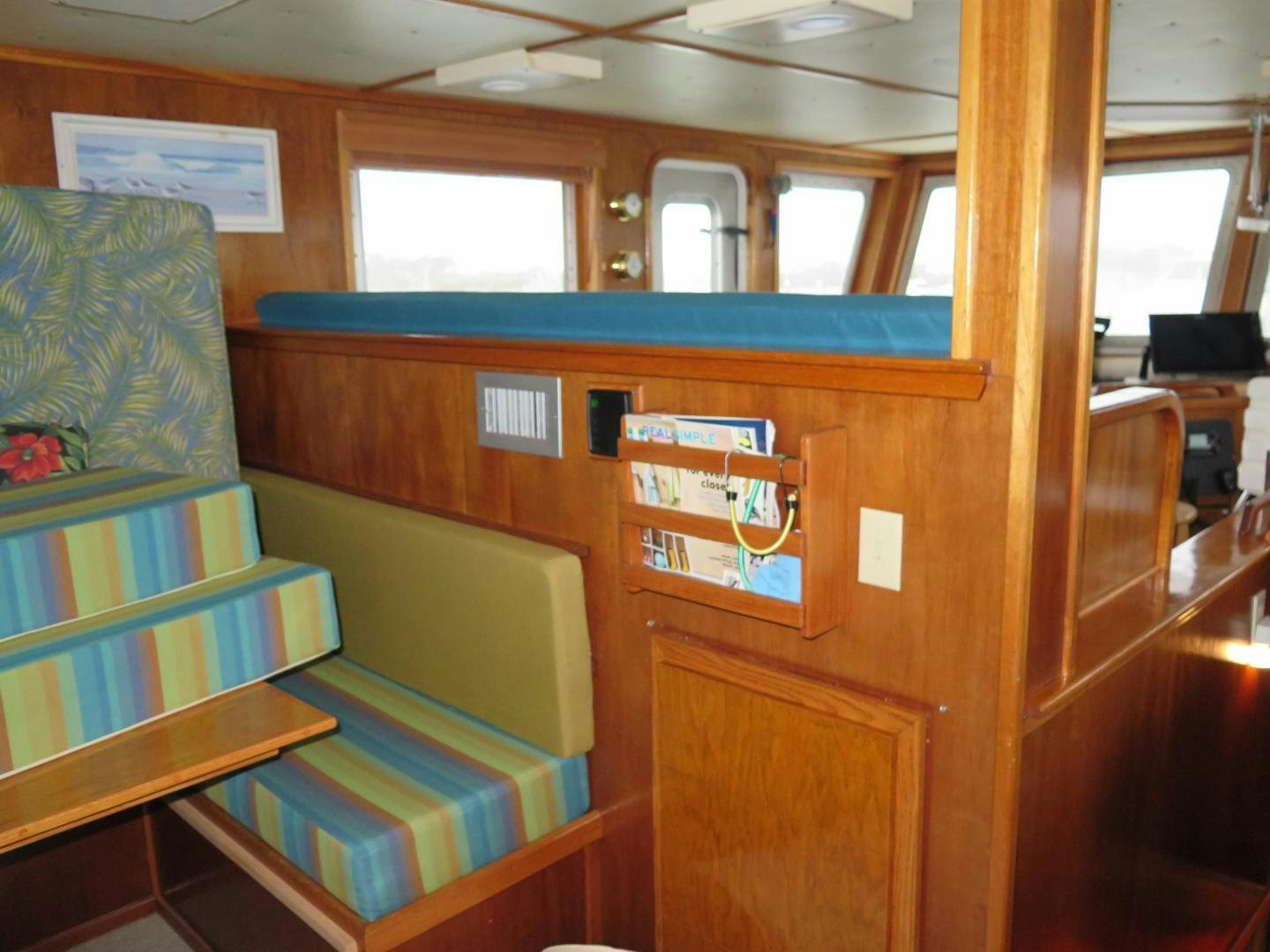 a room with a bunk bed and a chair aboard WANDERER Yacht for Sale