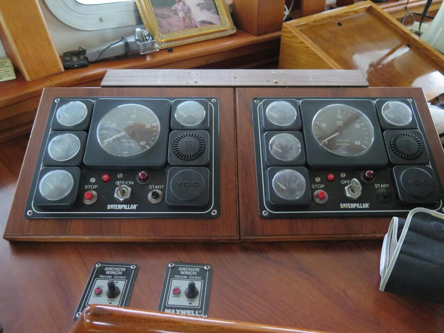 a group of radio devices on a table aboard WANDERER Yacht for Sale