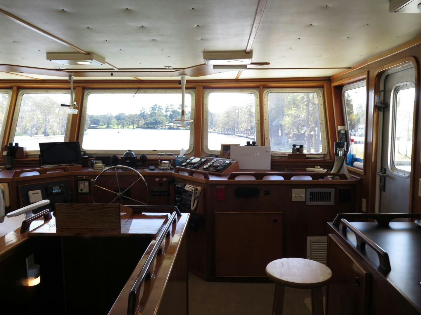 a room with a desk and a window aboard WANDERER Yacht for Sale