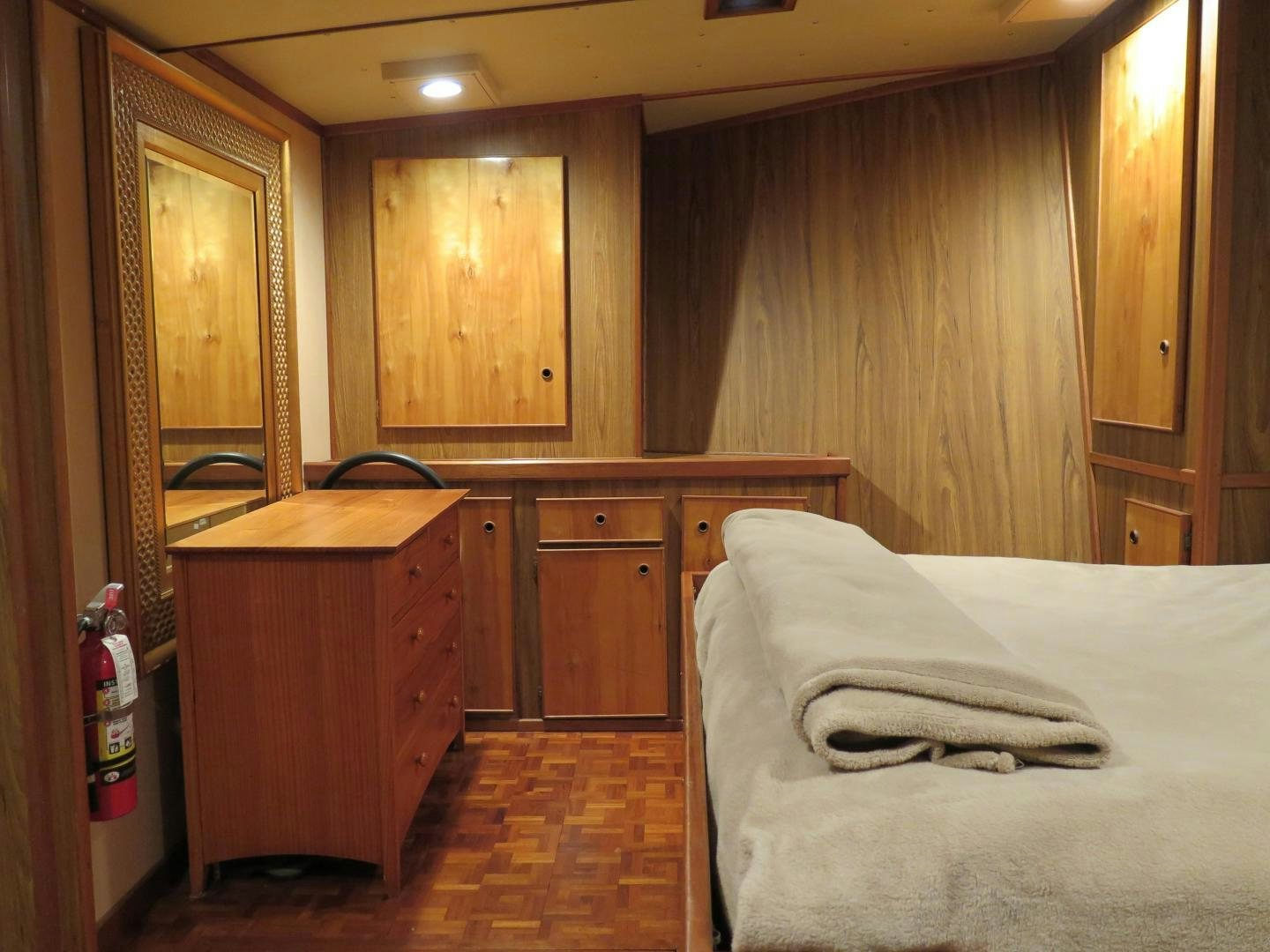a bed in a room aboard WANDERER Yacht for Sale