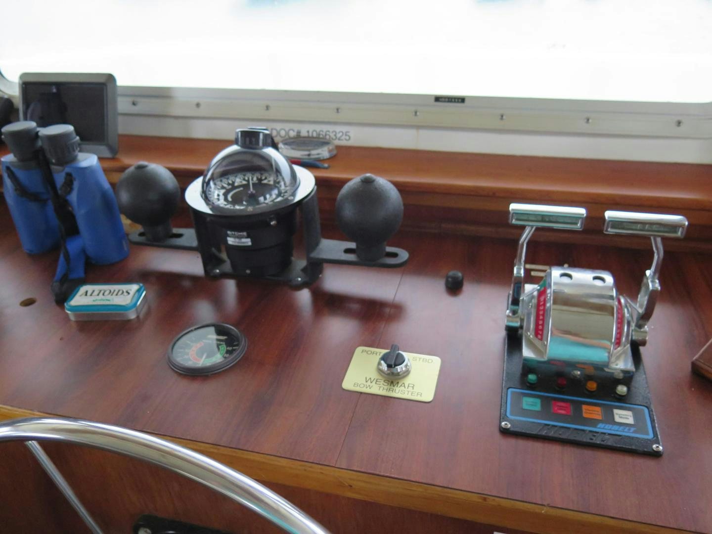 a group of toys on a desk aboard WANDERER Yacht for Sale