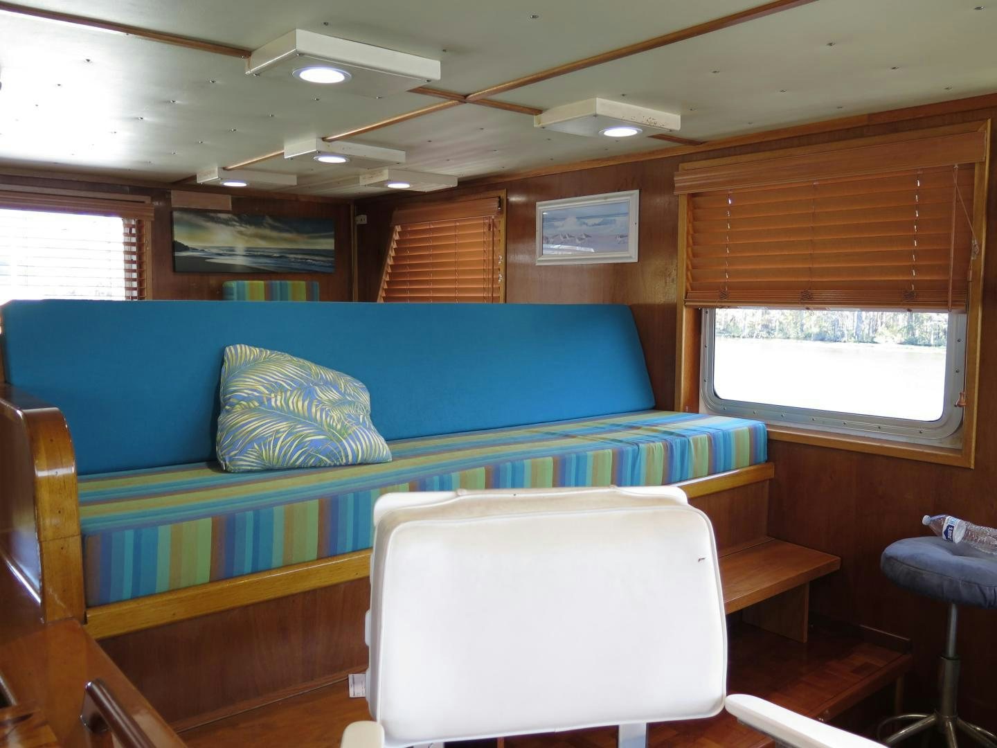 a room with a couch and a chair aboard WANDERER Yacht for Sale