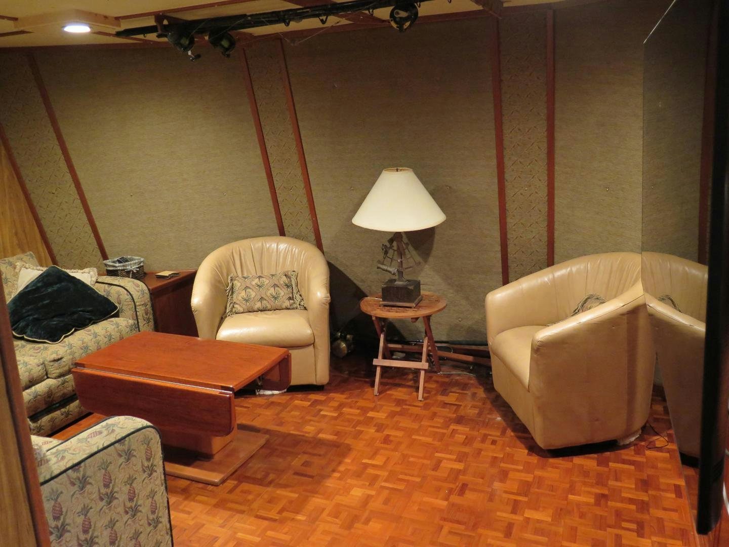 a bathroom with a tub and a couch aboard WANDERER Yacht for Sale