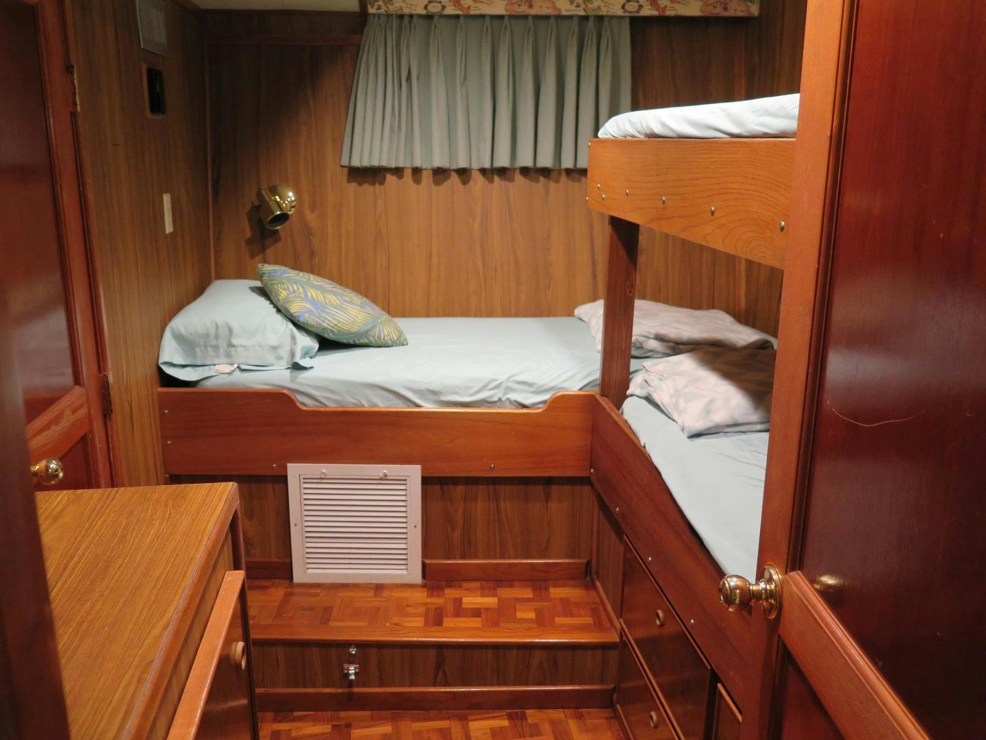 a room with bunk beds aboard WANDERER Yacht for Sale