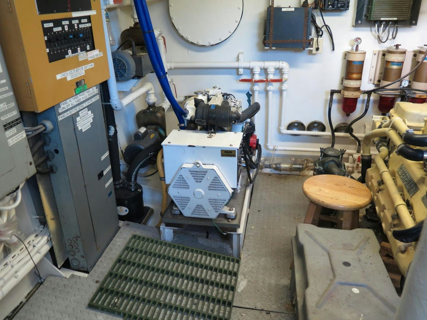 a room with machinery and a chair aboard WANDERER Yacht for Sale