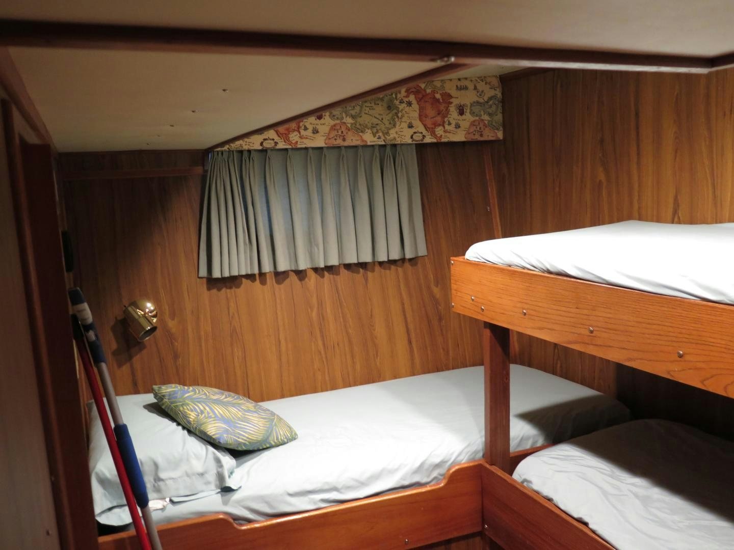 a room with two beds aboard WANDERER Yacht for Sale