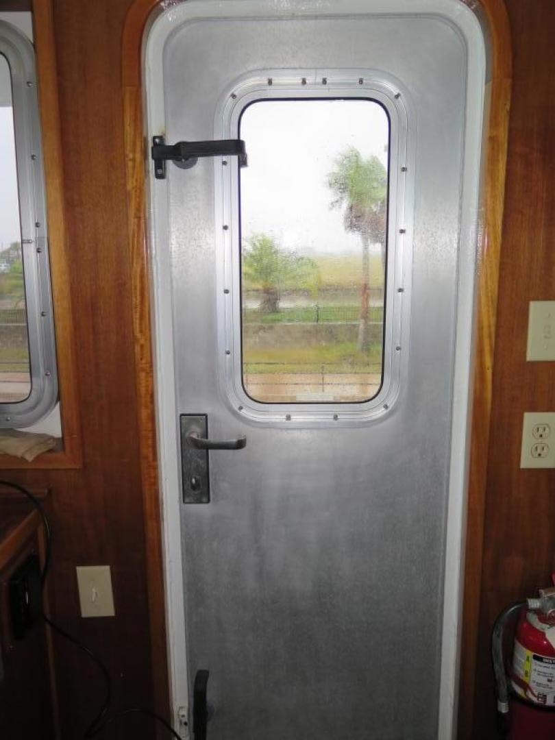 a door with a window aboard WANDERER Yacht for Sale