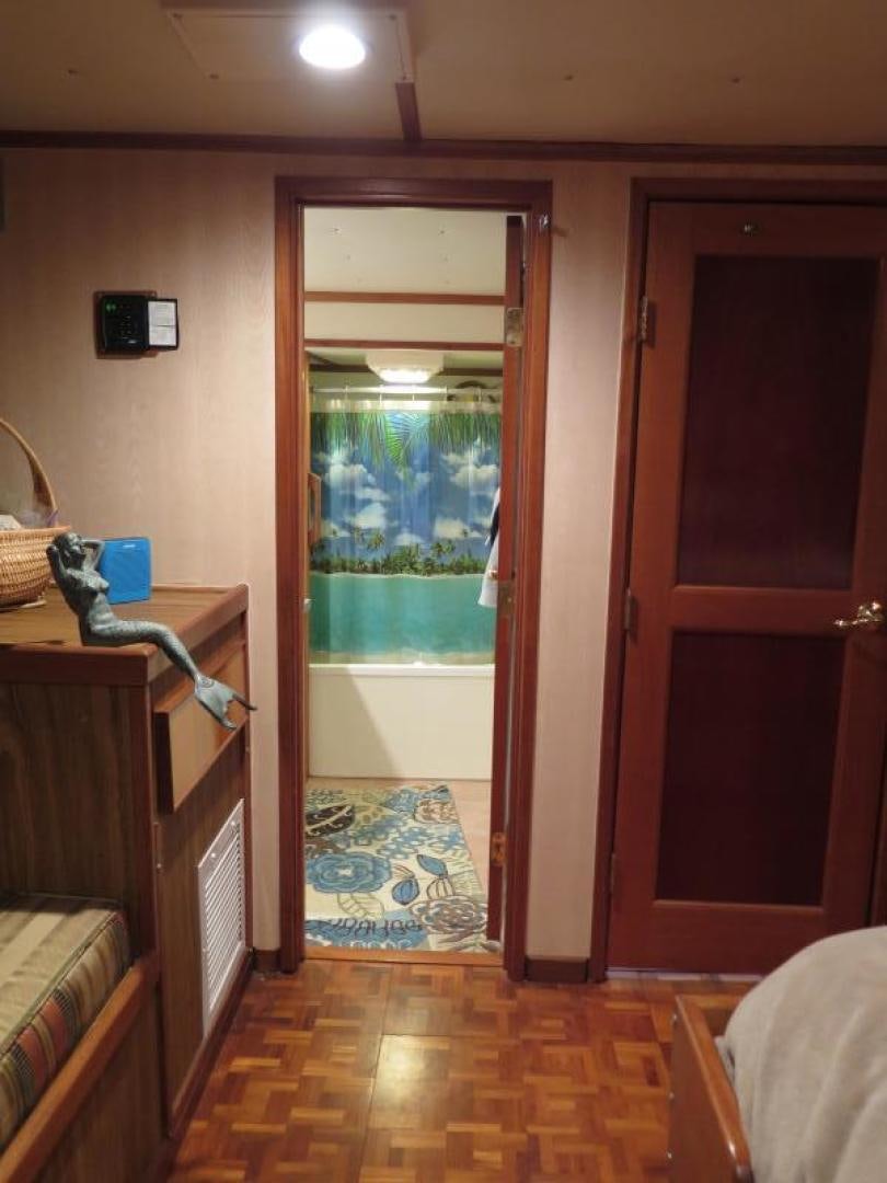 a room with a glass door aboard WANDERER Yacht for Sale