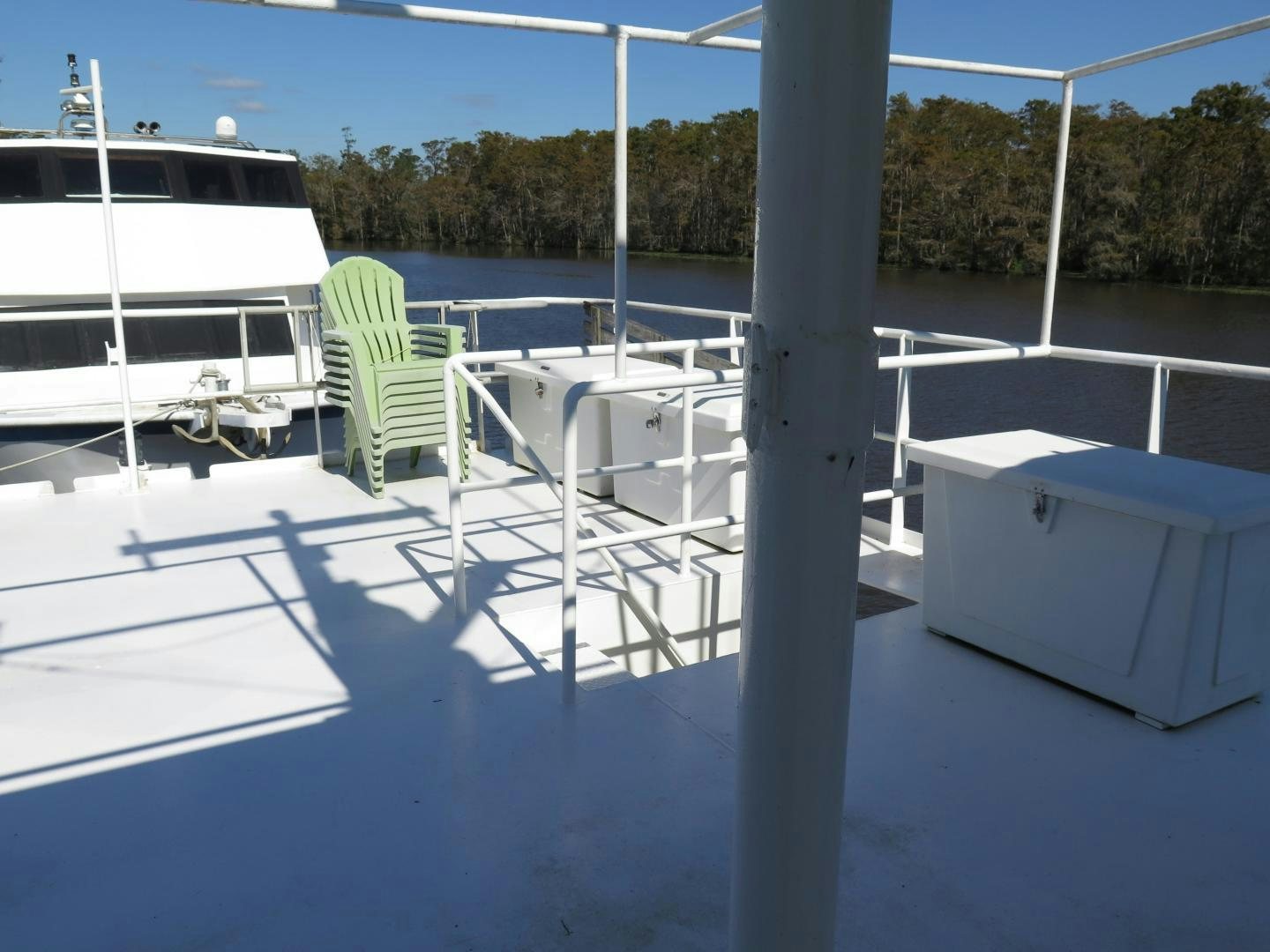 a deck with chairs and a table aboard WANDERER Yacht for Sale