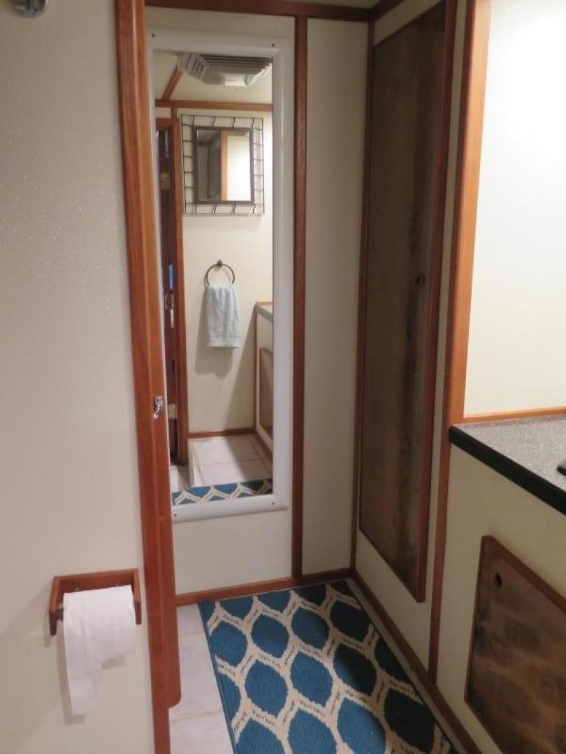 a bathroom with a mirror aboard WANDERER Yacht for Sale