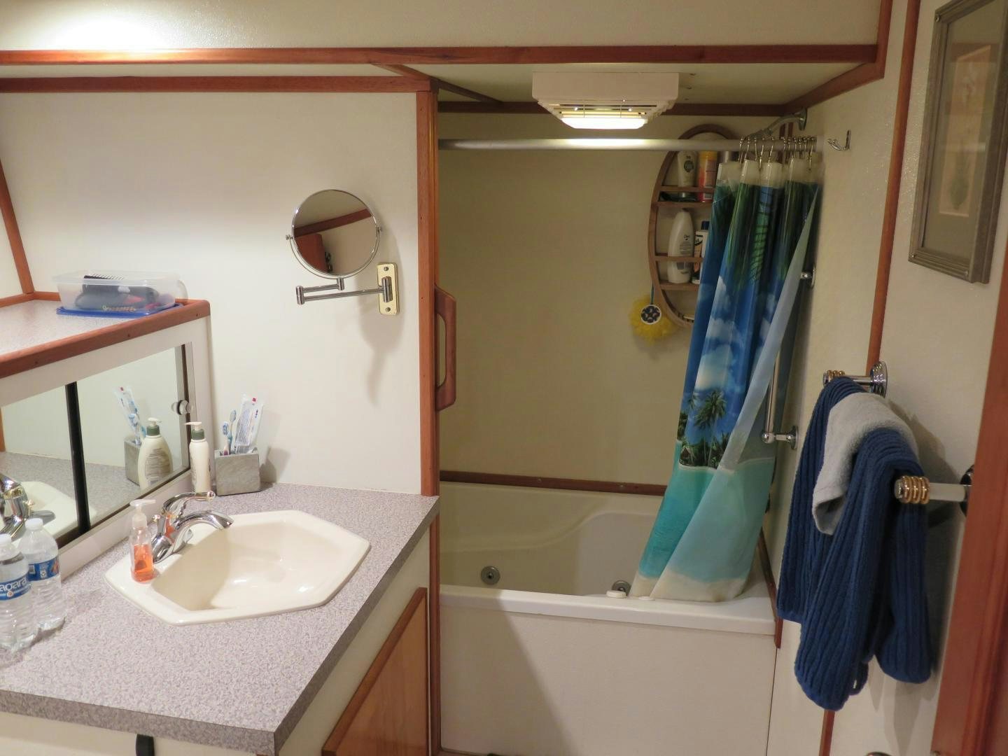 a bathroom with a sink and a bathtub aboard WANDERER Yacht for Sale