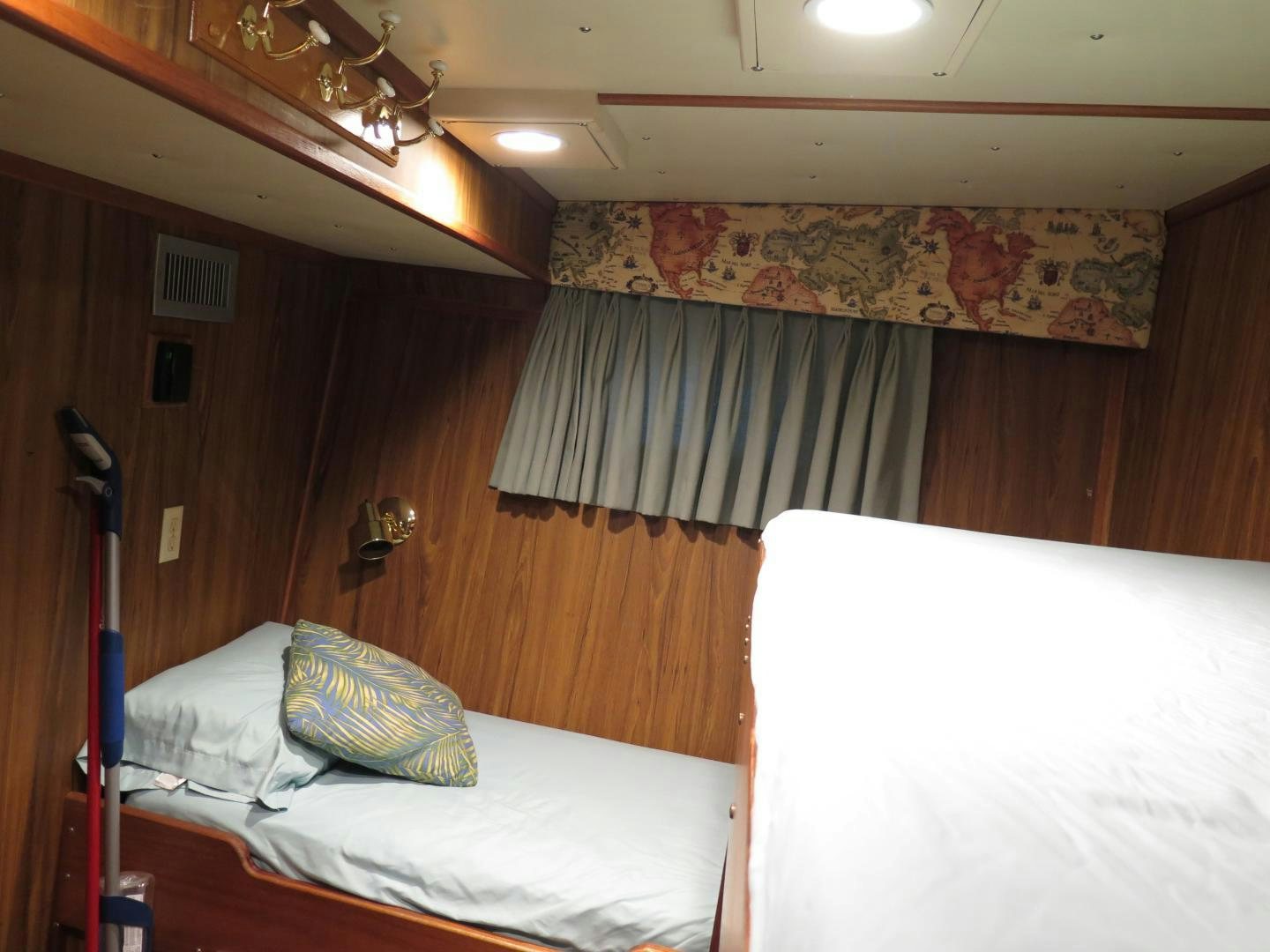a room with two beds aboard WANDERER Yacht for Sale