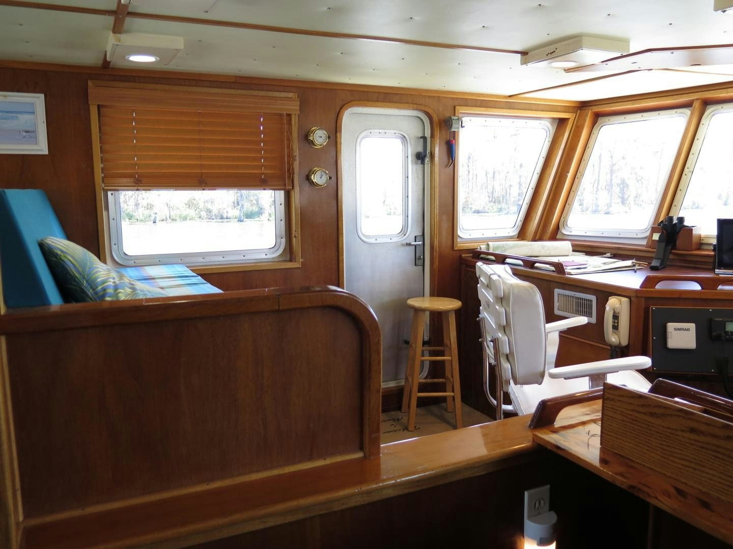 a room with a desk and chairs aboard WANDERER Yacht for Sale