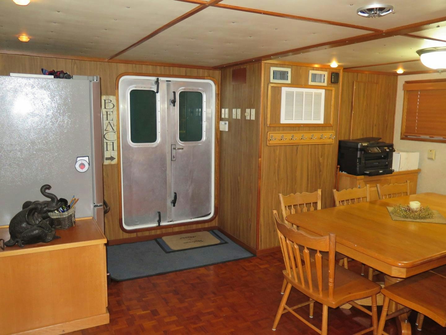 a room with a table and chairs aboard WANDERER Yacht for Sale