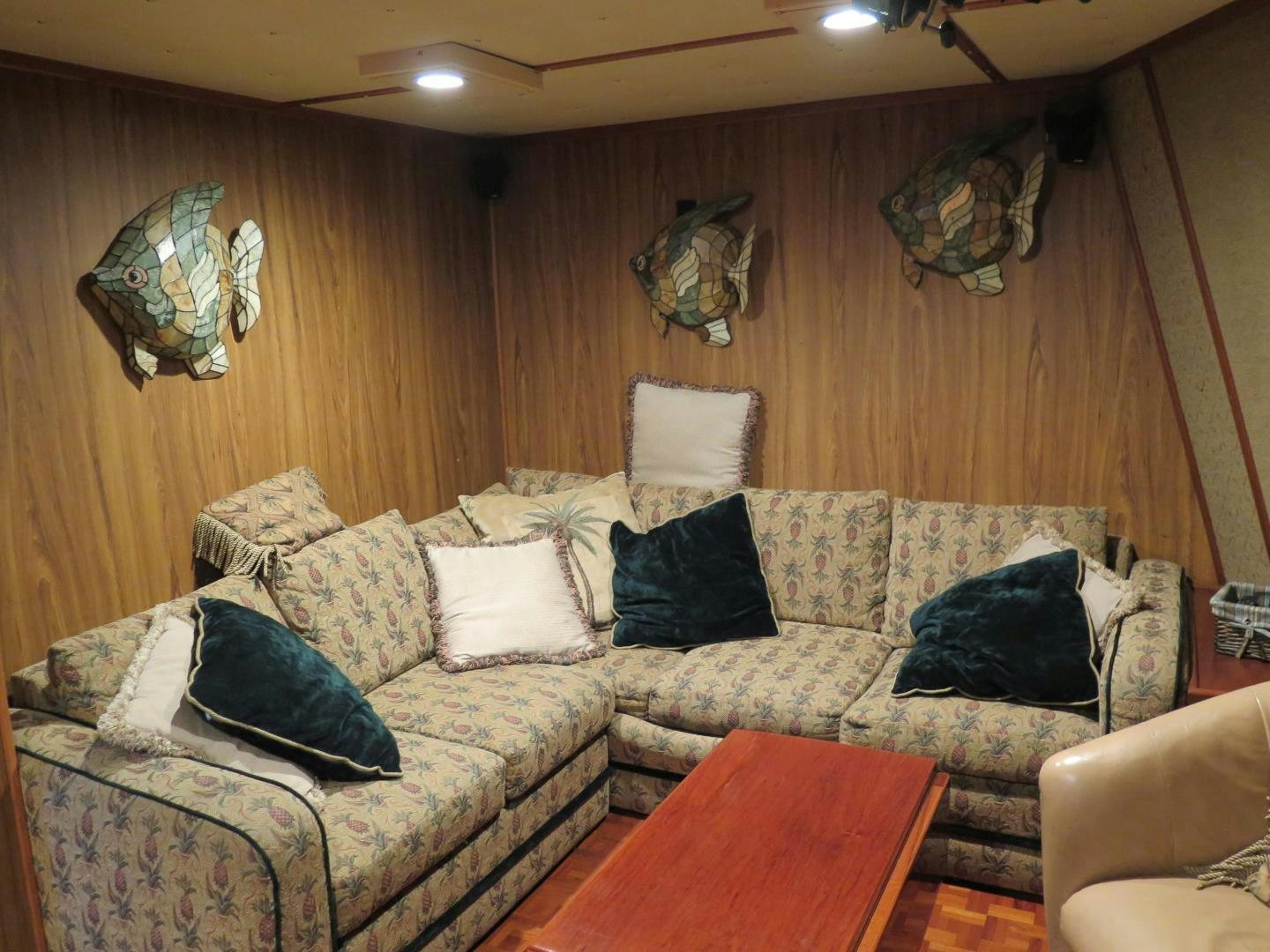 a living room with a couch and a table aboard WANDERER Yacht for Sale