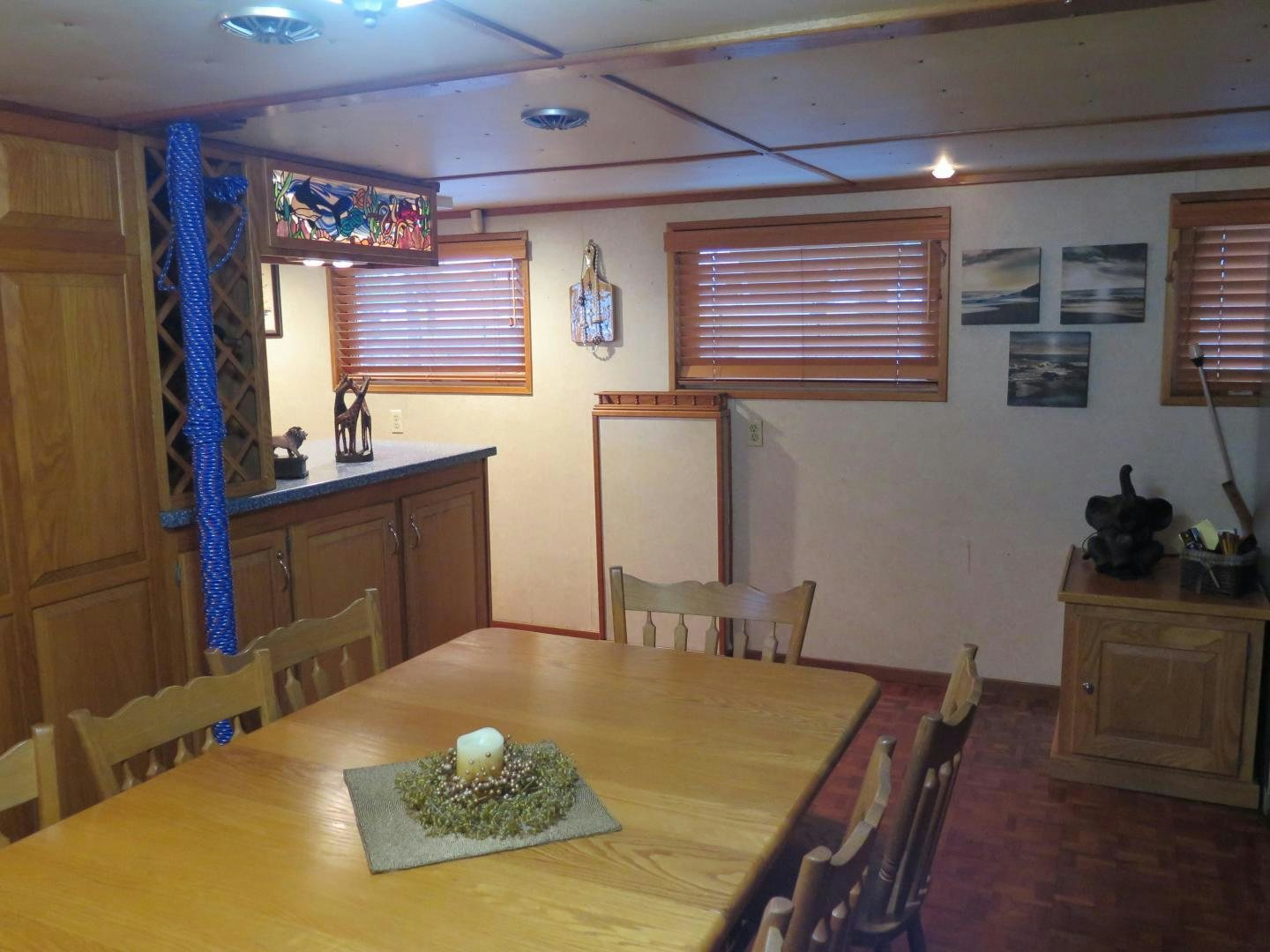 a dining table in a room aboard WANDERER Yacht for Sale