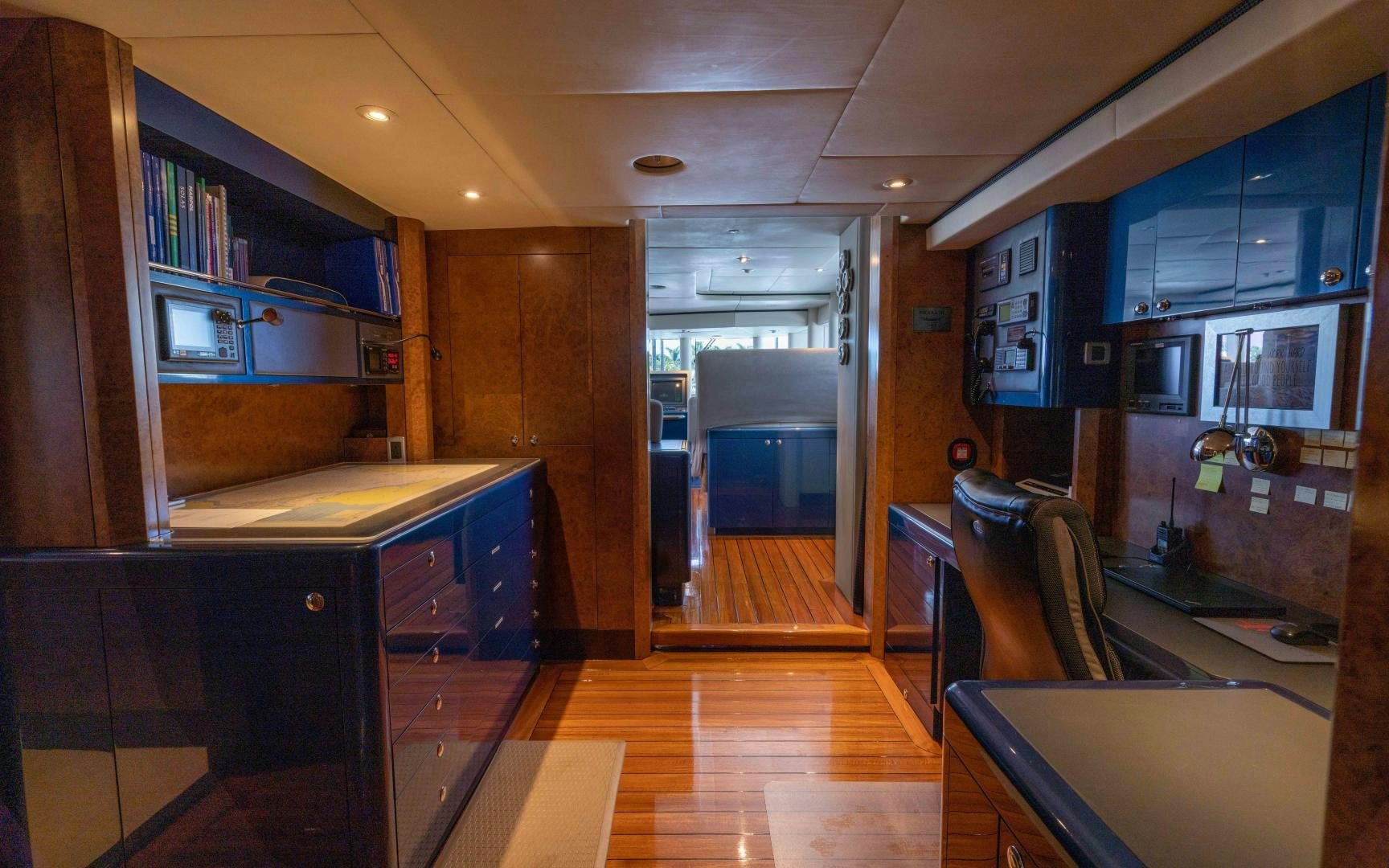 a kitchen with a counter and cabinets aboard 4 ROSES Yacht for Sale