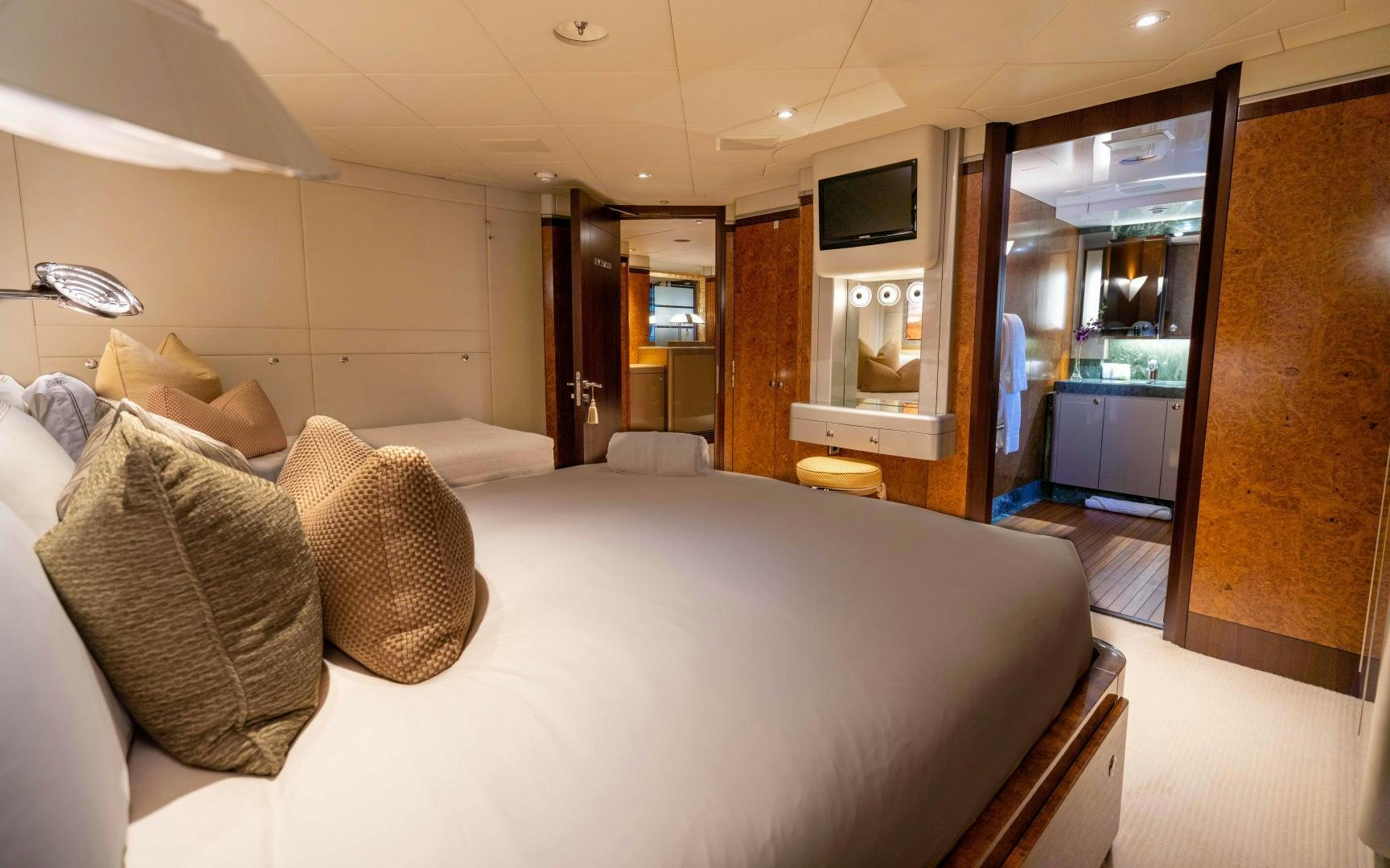 a bed in a room aboard 4 ROSES Yacht for Sale