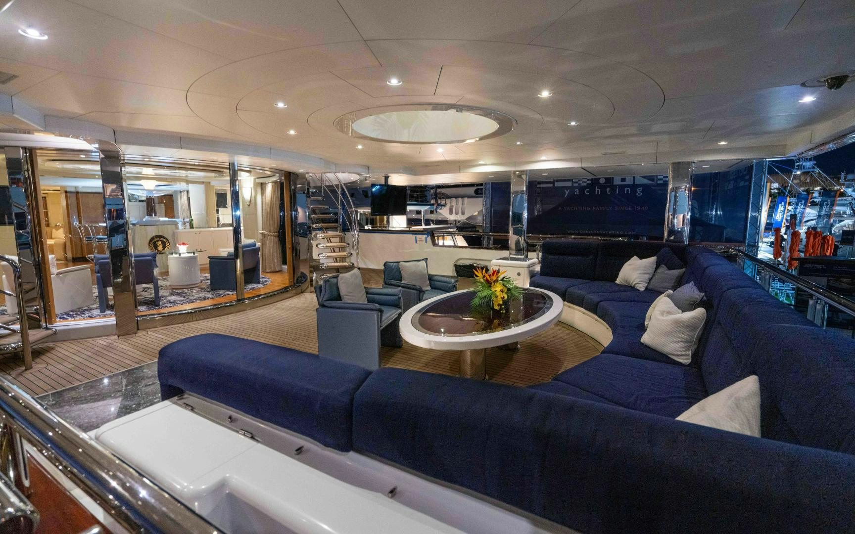 a room with a table and chairs aboard 4 ROSES Yacht for Sale