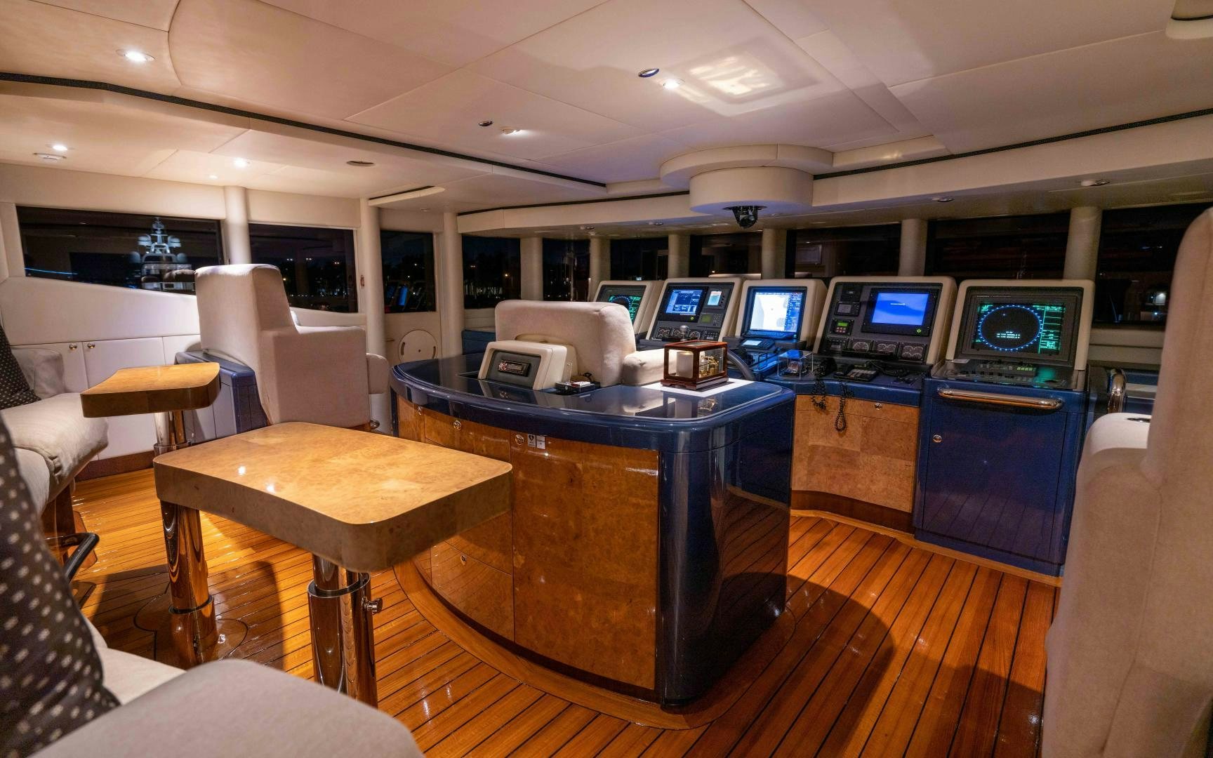 a room with a table and chairs aboard 4 ROSES Yacht for Sale