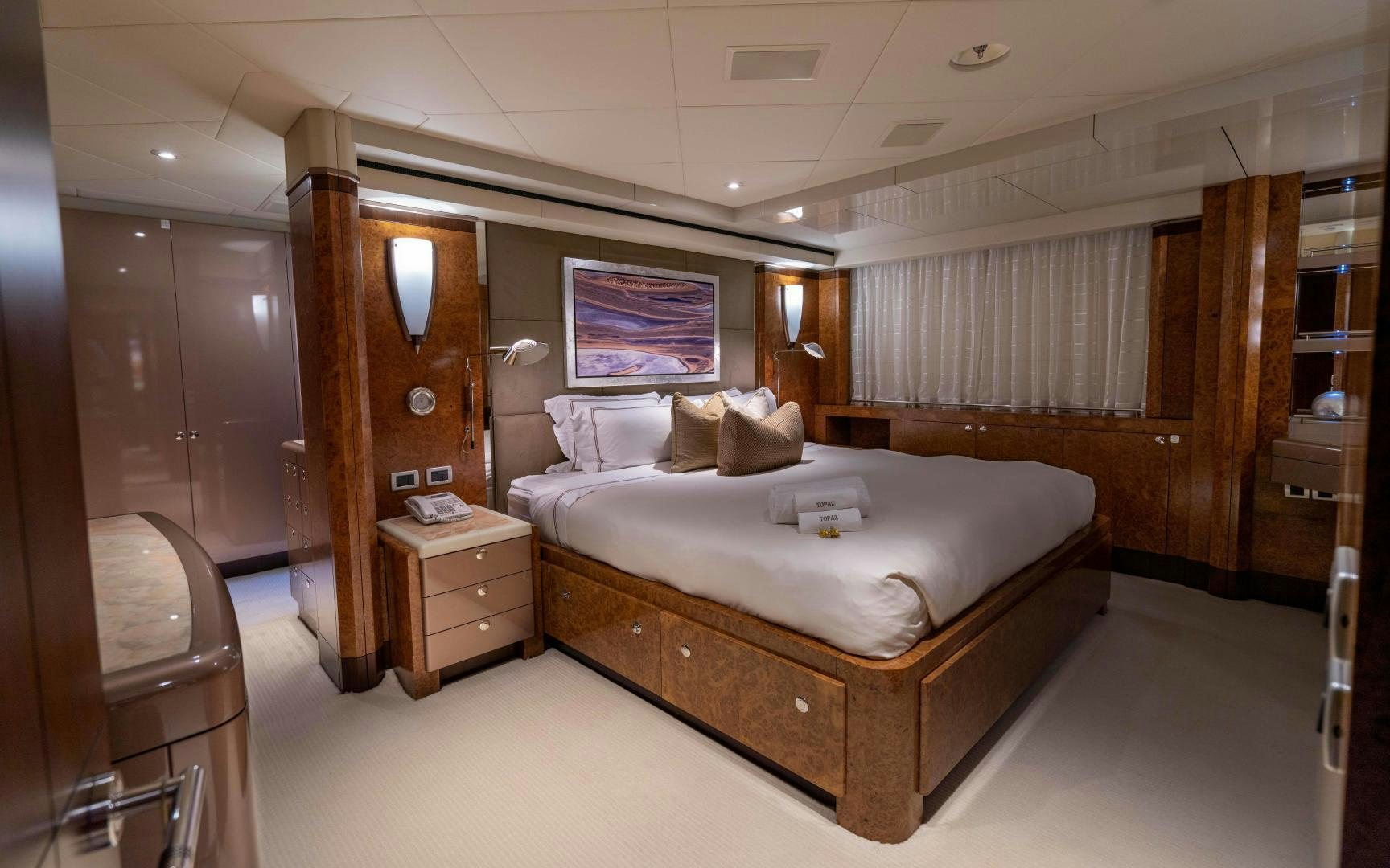 a large bed in a room aboard 4 ROSES Yacht for Sale