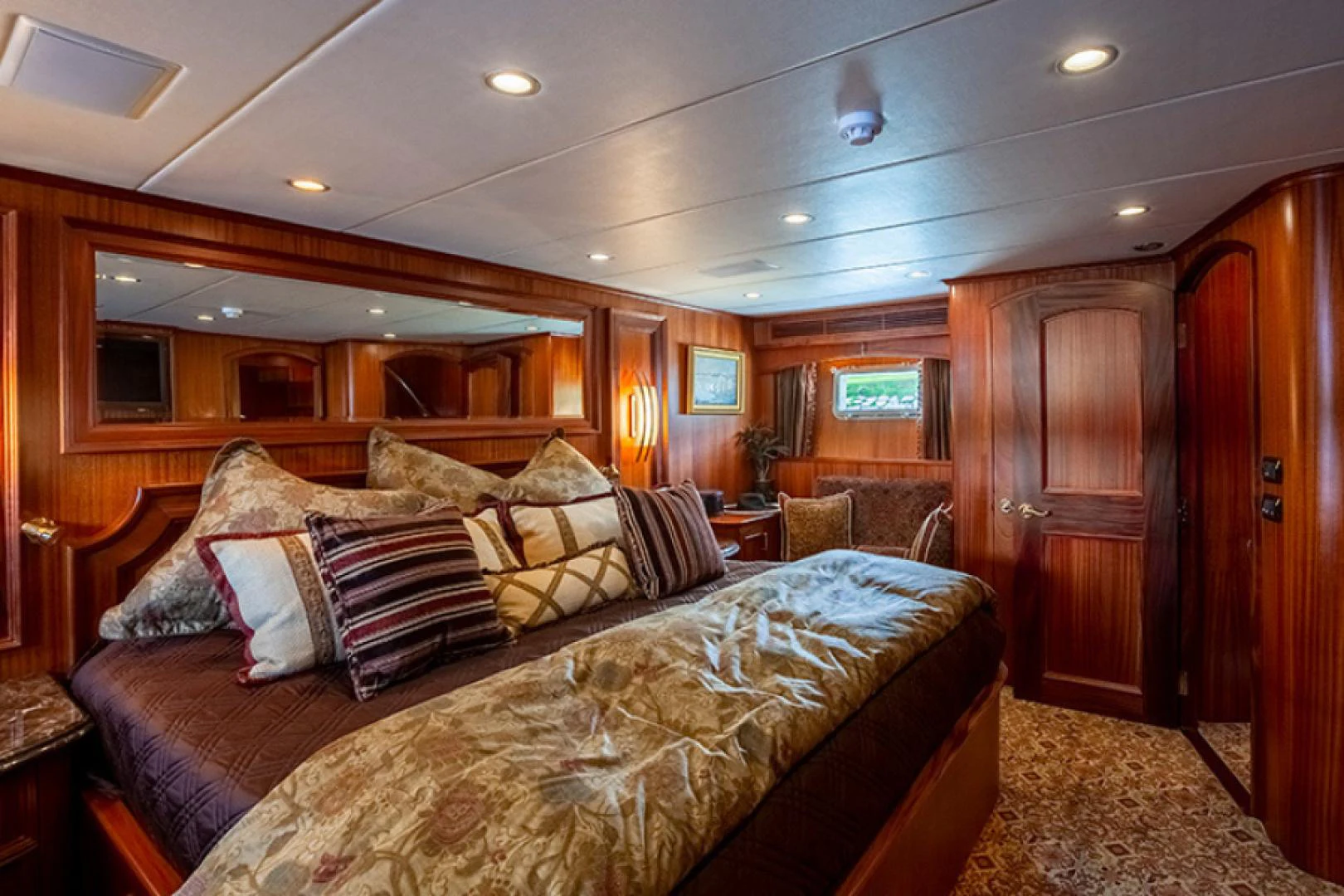 a large bed in a cabin aboard RHAPSODY Yacht for Sale