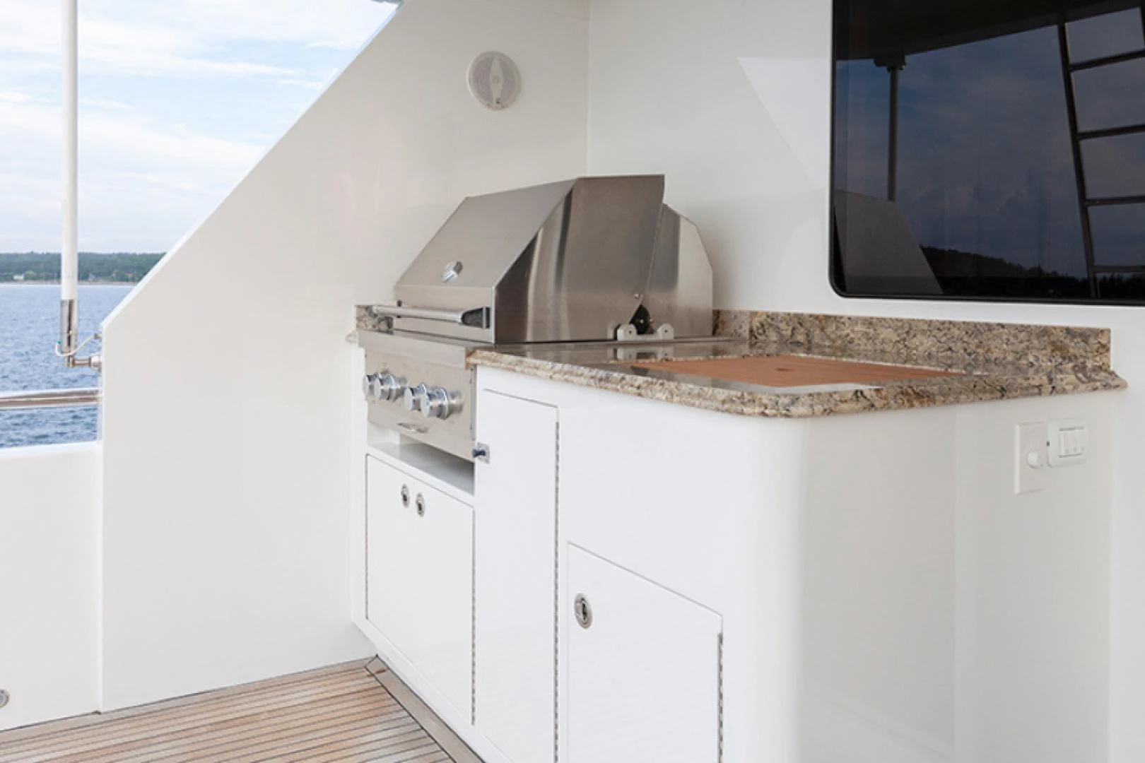 a kitchen with a microwave aboard RHAPSODY Yacht for Sale