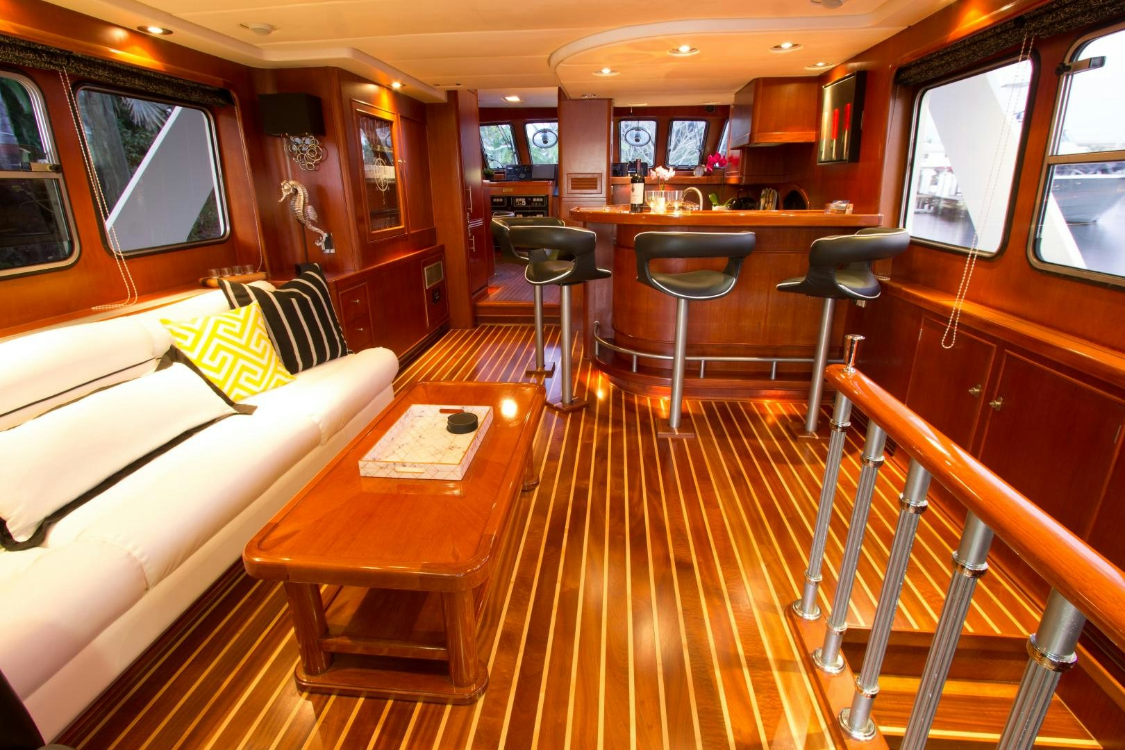 a room with a couch and a table aboard SEAEO Yacht for Sale