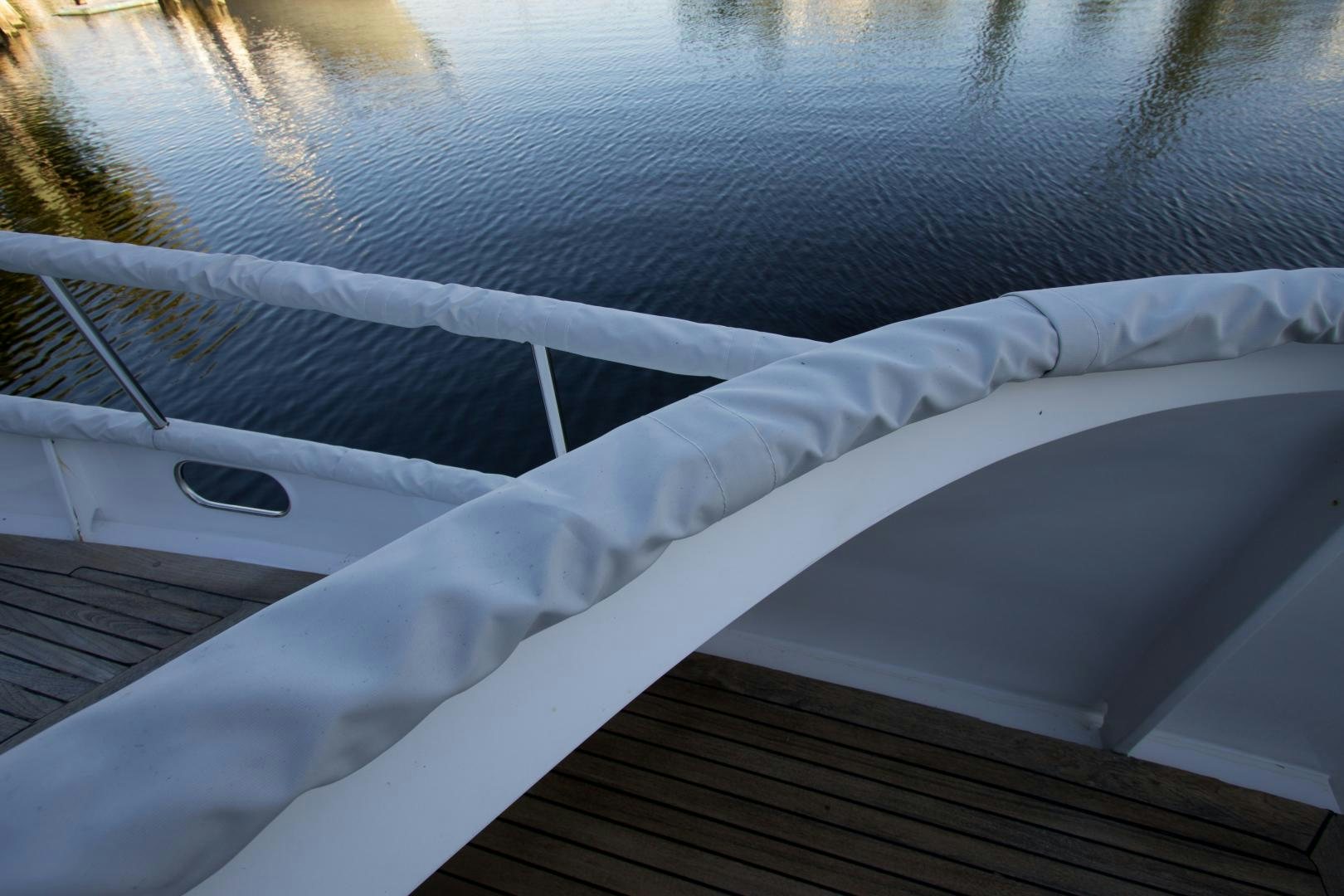a white boat in the water aboard SEAEO Yacht for Sale