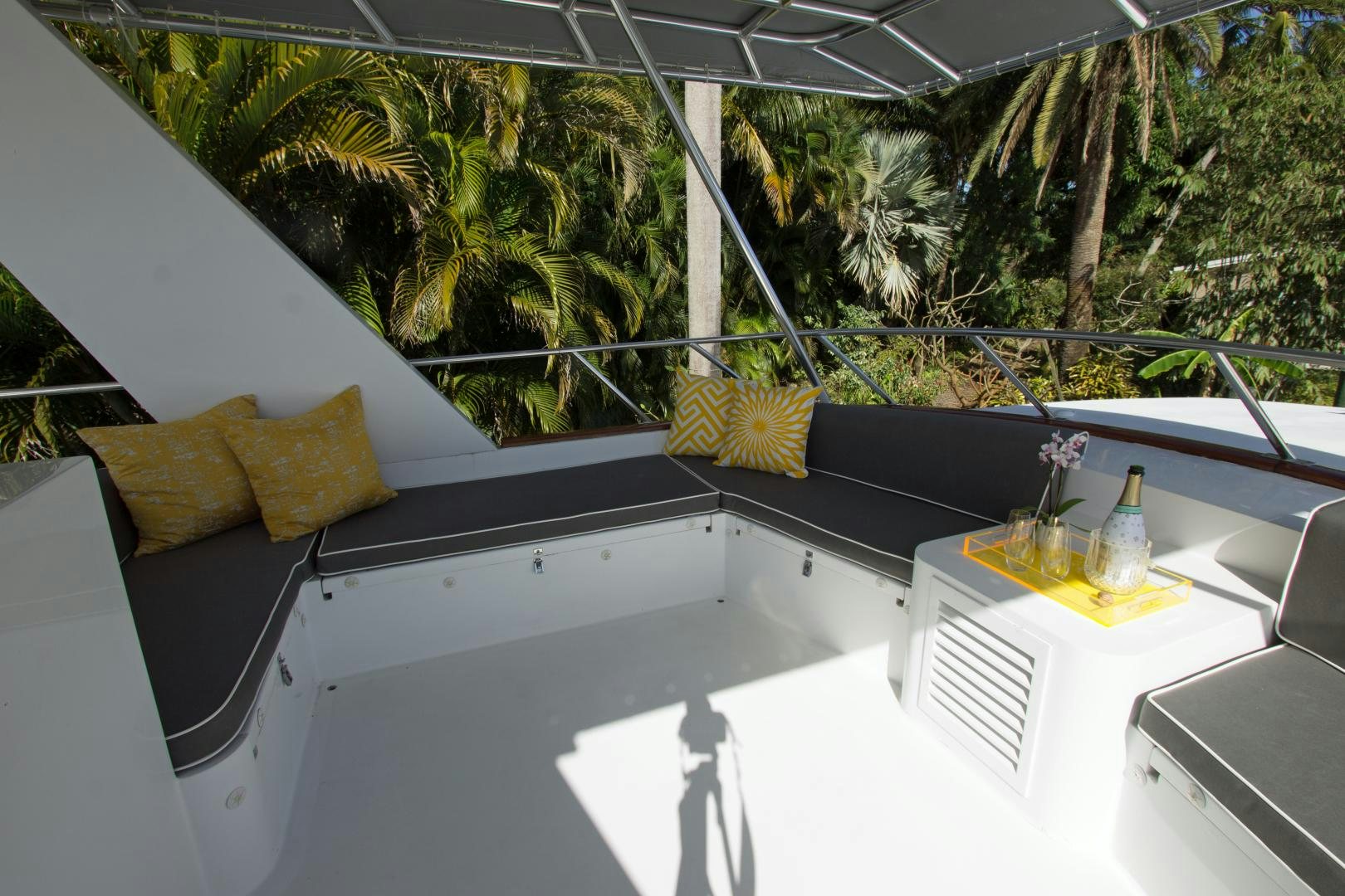 a balcony with a view of the trees and the ocean aboard SEAEO Yacht for Sale