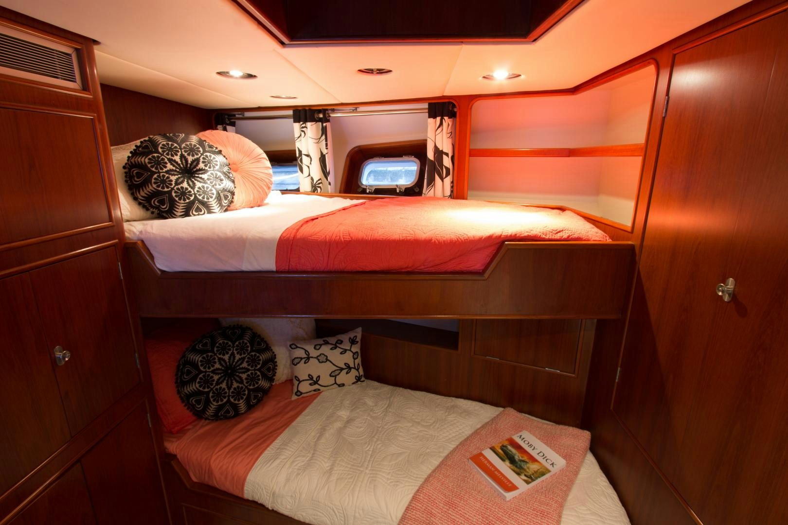 a bedroom with a bed and a television aboard SEAEO Yacht for Sale