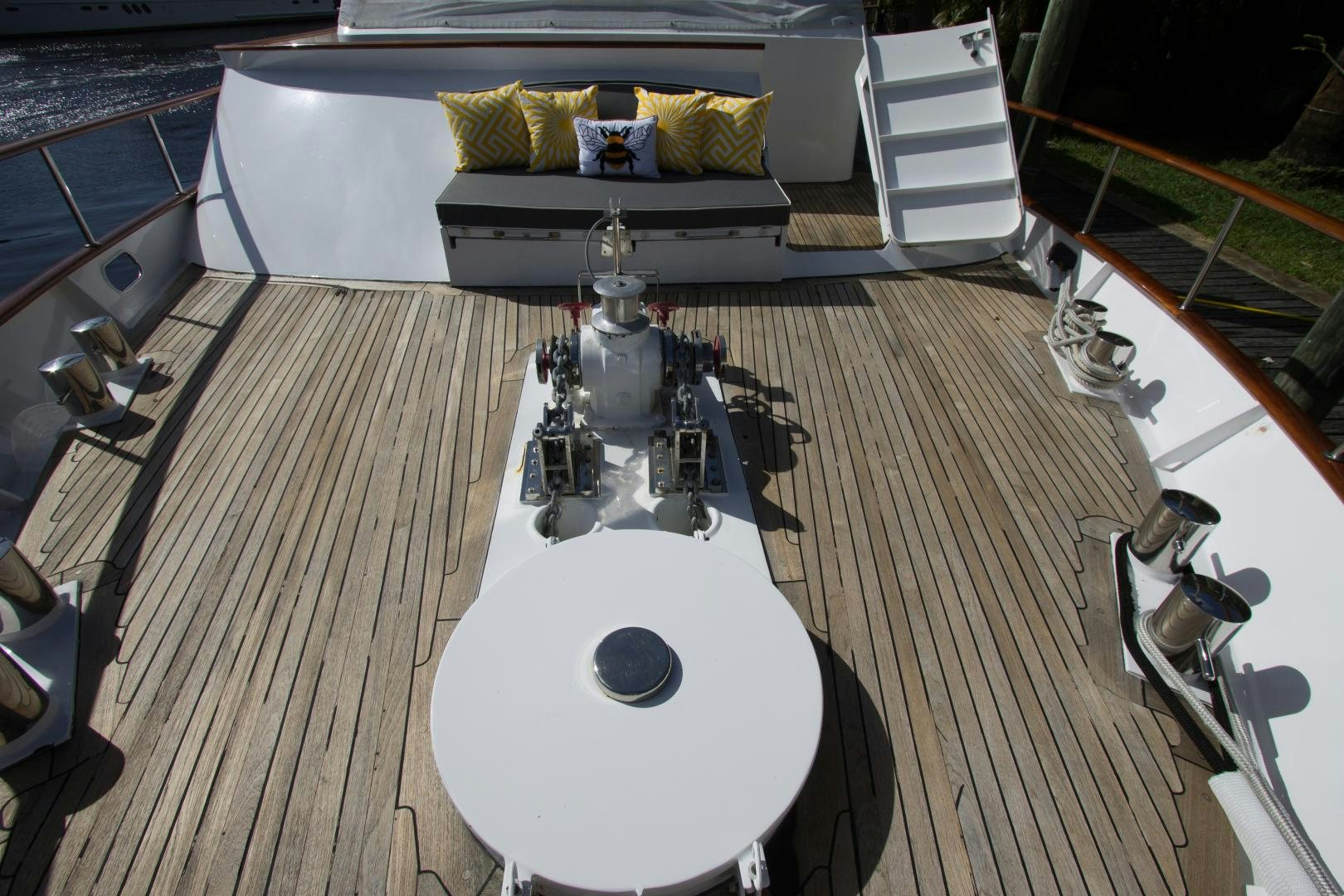 a white record player on a wooden floor aboard SEAEO Yacht for Sale