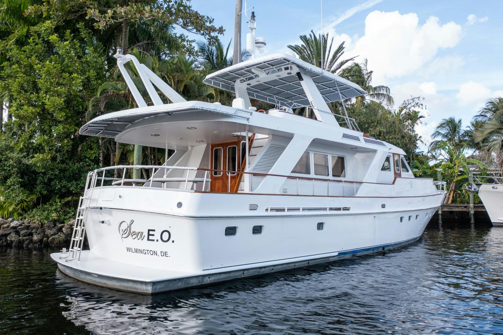 a white boat in a body of water aboard SEAEO Yacht for Sale