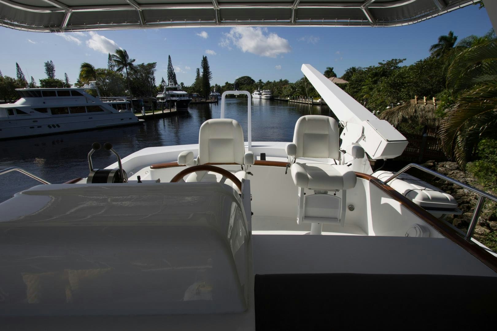 a boat with chairs on it aboard SEAEO Yacht for Sale
