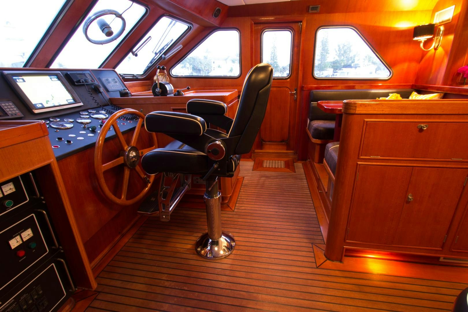 a black chair in a train aboard SEAEO Yacht for Sale