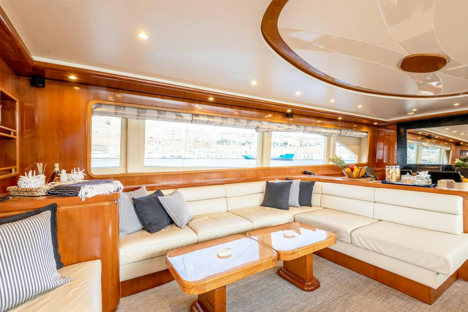 a room with a couch and a table aboard SEA FALCON Yacht for Sale