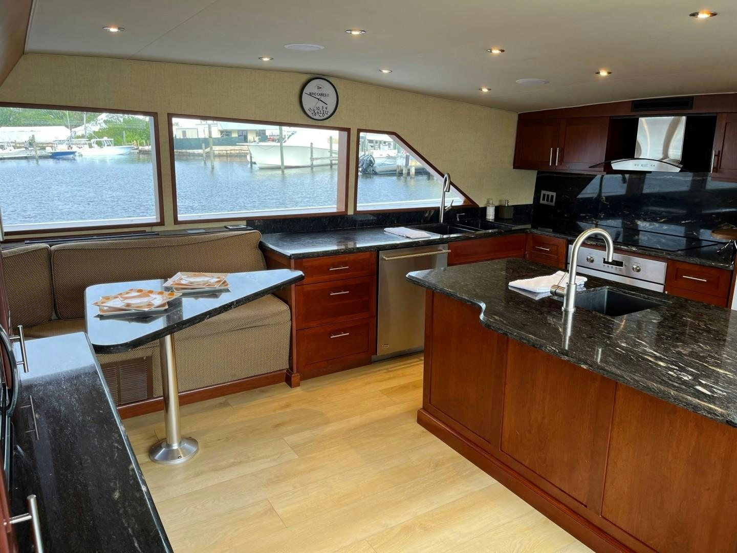 a kitchen with a large island aboard CORDINA Yacht for Sale