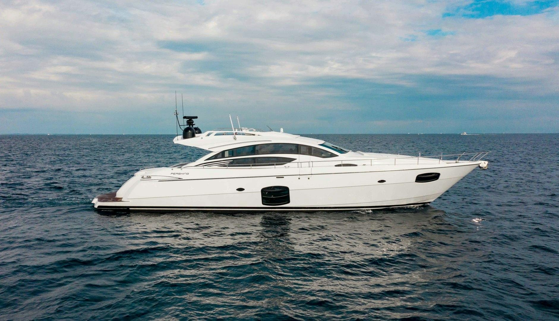 a white yacht in the water aboard JULIE K Yacht for Sale