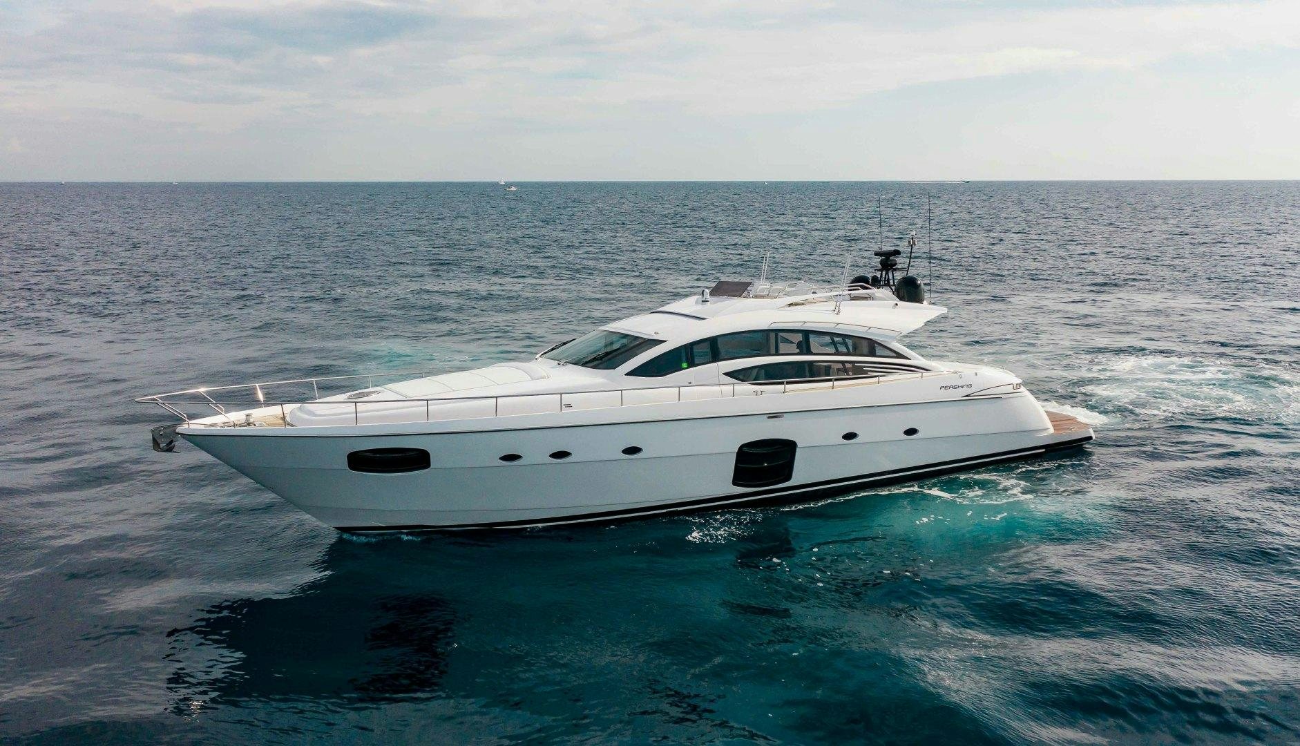 a white boat in the water aboard JULIE K Yacht for Sale