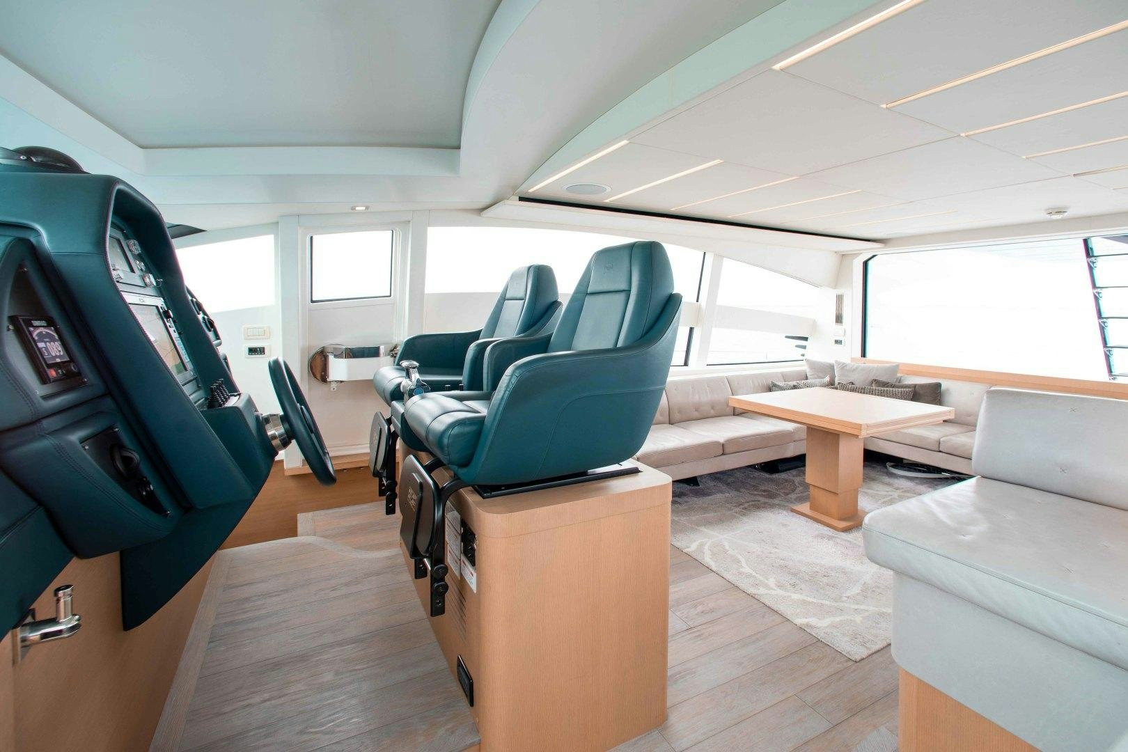 a room with a couch and a table aboard JULIE K Yacht for Sale