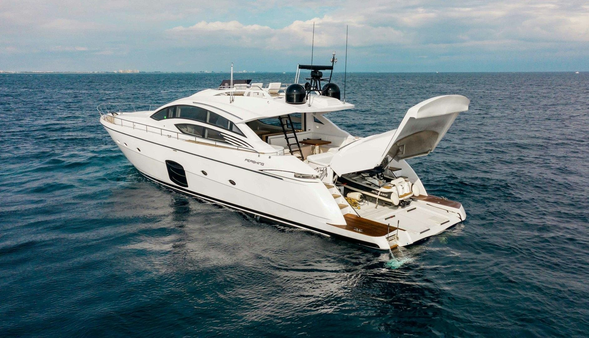 a white yacht in the water aboard JULIE K Yacht for Sale