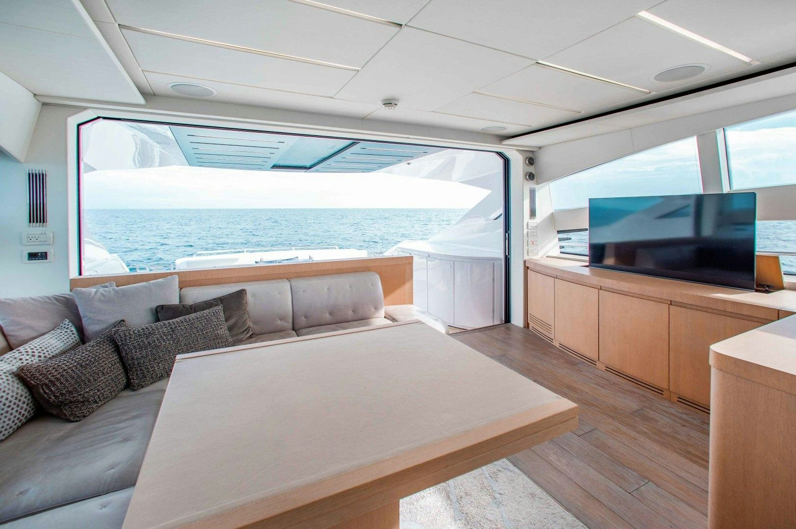 a room with a bed and a tv aboard JULIE K Yacht for Sale