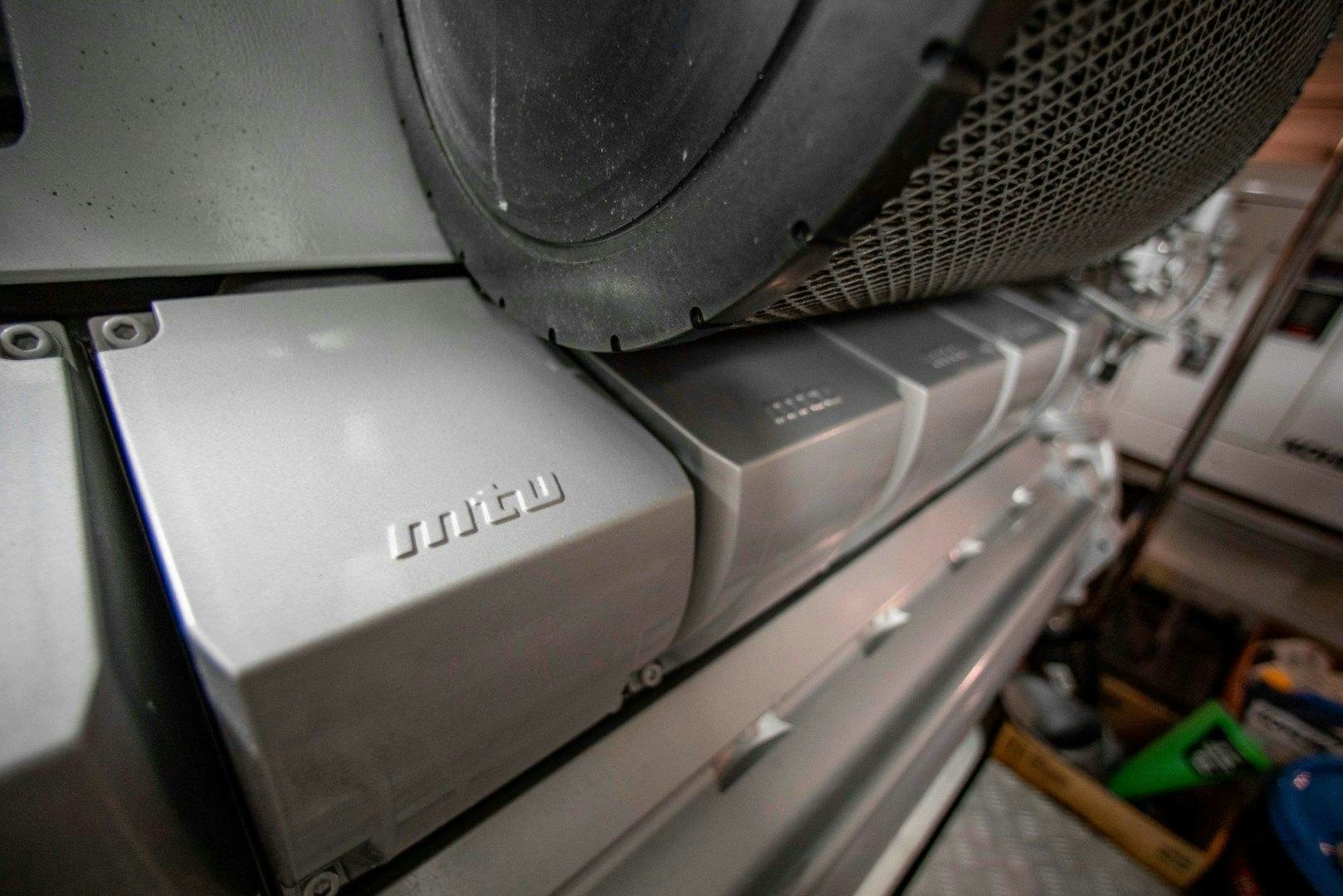 a silver and black machine aboard JULIE K Yacht for Sale