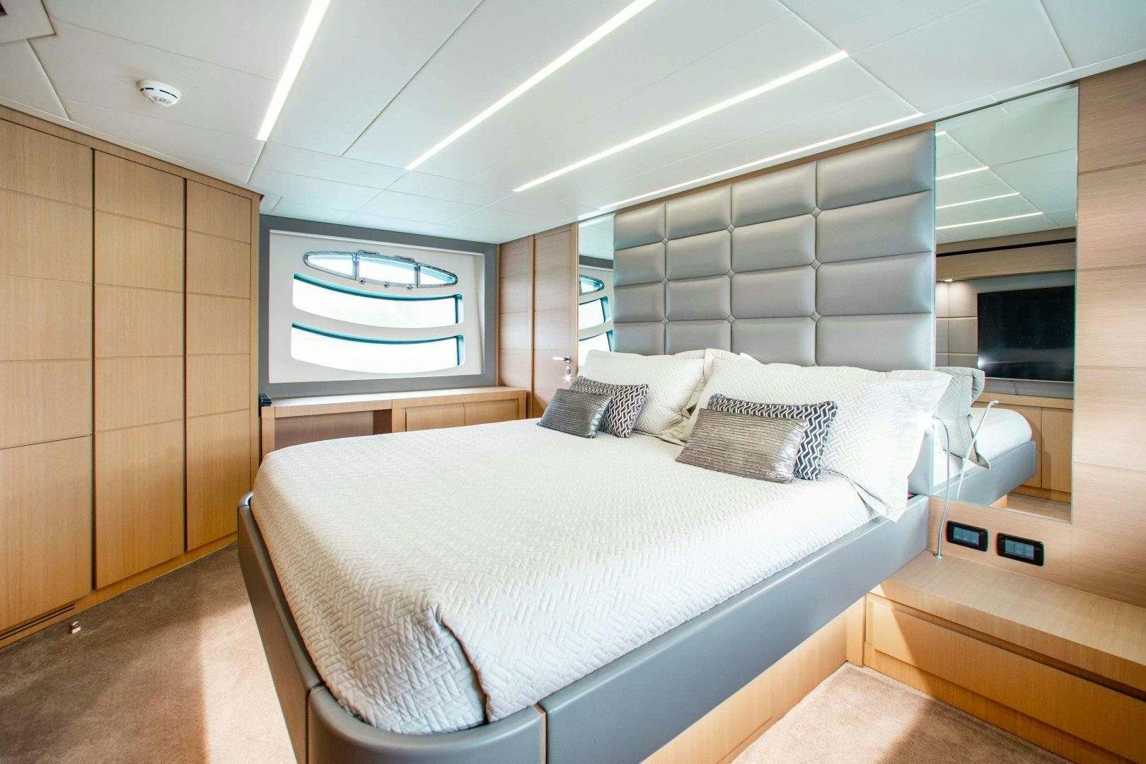 a bed in a room aboard JULIE K Yacht for Sale