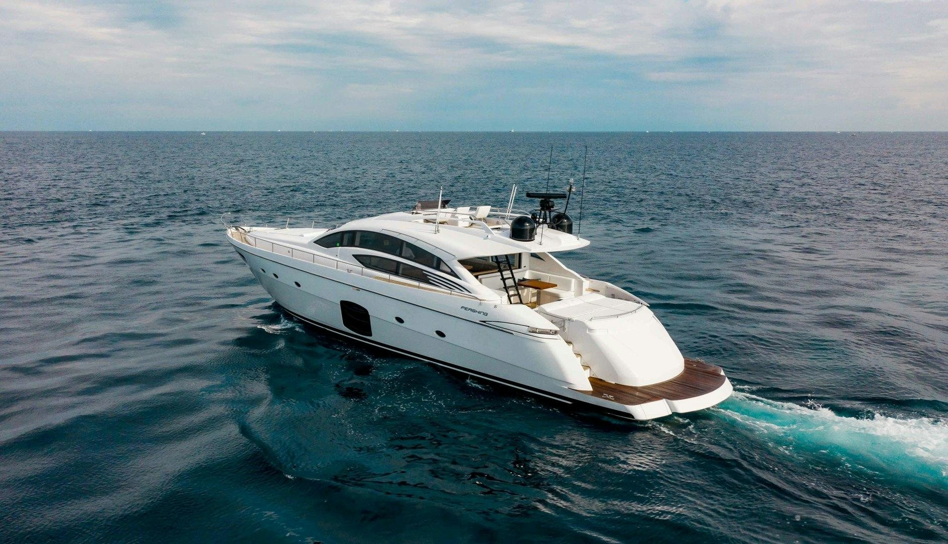 a white yacht in the water aboard JULIE K Yacht for Sale